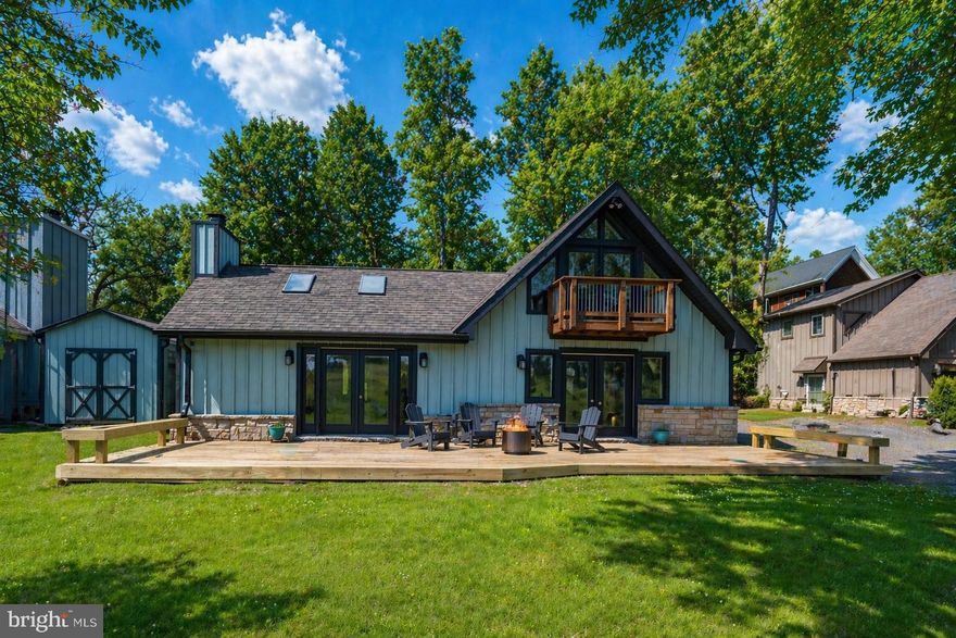 Enjoy the best of Deep Creek Lake living in this charming 3-bedroom, 2-bath lakefront home offering breathtaking water views and easy, level access to the shoreline. With a shared dock and your own designated dock slip, you can spend your days boating, fishing, or simply soaking in the peaceful surroundings. The open-concept layout features plenty of natural light and scenic lake vistas from nearly every room. Perfectly situated close to restaurants, shops, Wisp Resort, and all area amenities, this home combines relaxation and convenience in one ideal lakefront retreat. Whether you’re seeking a year-round residence, vacation getaway, or investment property, this Deep Creek gem has it all.