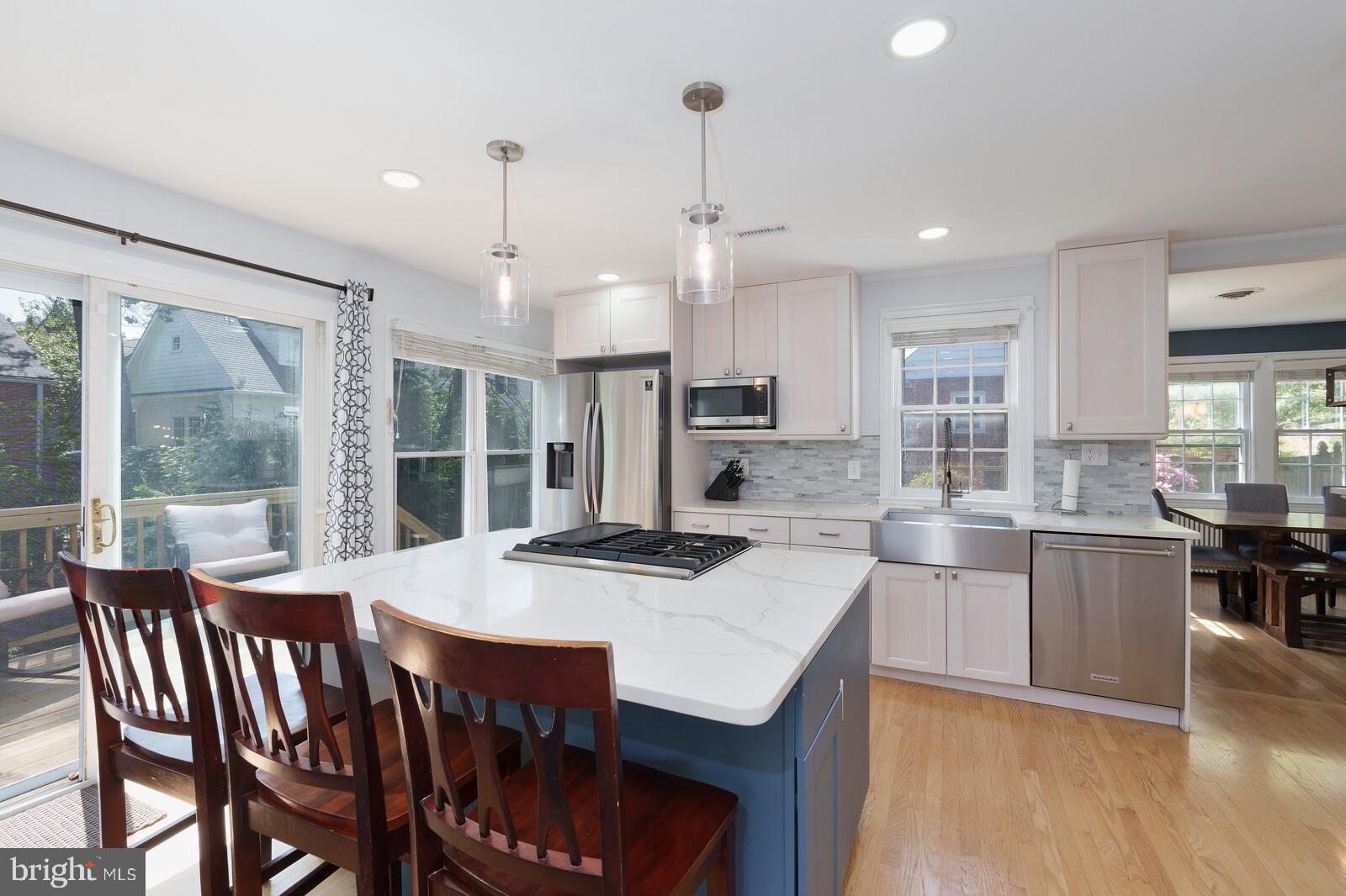 Charming and Refined Living in the Heart of Downtown Bethesda...Welcome to this beautifully expanded Cape Cod -- a true gem blending comfort and style in the super popular Glenbrook Village. Imagine living in your new home in a quiet neighborhood that’s also walkable to the vibrant heart of Downtown Bethesda. Well, imagine no more. This home offers a perfect blend of classic charm and modern amenities....This expanded home has a spacious master suite that serves as a serene retreat, featuring a custom walk-in closet, and an en suite bath adorned with marble finishes, a double vanity, and heated floors that add a touch of warm luxury anytime you want it. The large, open kitchen is a culinary dream with abundant storage, an oversized island, and sliding doors that open to a private backyard—including a new deck! Entertaining is a breeze in the generous dining area that flows seamlessly into the inviting living room or the deck. The finished basement adds a layer of functionality and leisure, equipped with a recreational room, wet bar, full bath, ample storage, and inside access to the backyard....Living here means more than just enjoying a beautiful home—it’s about embracing a lifestyle. Stroll to the nearby Harris Teeter for your grocery needs (under a 1/3 of a mile), or explore an array of dining options just steps from your door. The neighborhood is alive with hot spots all within a mile, inviting you to experience everything from casual cafes to fine dining to the Apple store....Strategically positioned with near instant access to both Wisconsin Avenue and Jones Bridge Road, you'll love the easy entry into all the perks of downtown Bethesda while being just a quick drive (or METRO) away from the surrounding top areas. Speaking of the METRO -- you have two METRO stops about a 1/2 mile away. Or maybe you jump on your bike day one day for a ride to Georgetown on the Capital Crescent Trail. It's all here! Whether it’s for work or leisure, this location ensures you’re connected to the best of urban living and the tranquility of your private oasis....This home isn’t just a place to live—it’s a space to thrive, surrounded by the best Bethesda has to offer. Perfect for those who appreciate style, comfort, and a vibrant community right at their doorstep. Make it yours and experience a lifestyle where convenience and comfort intersect.