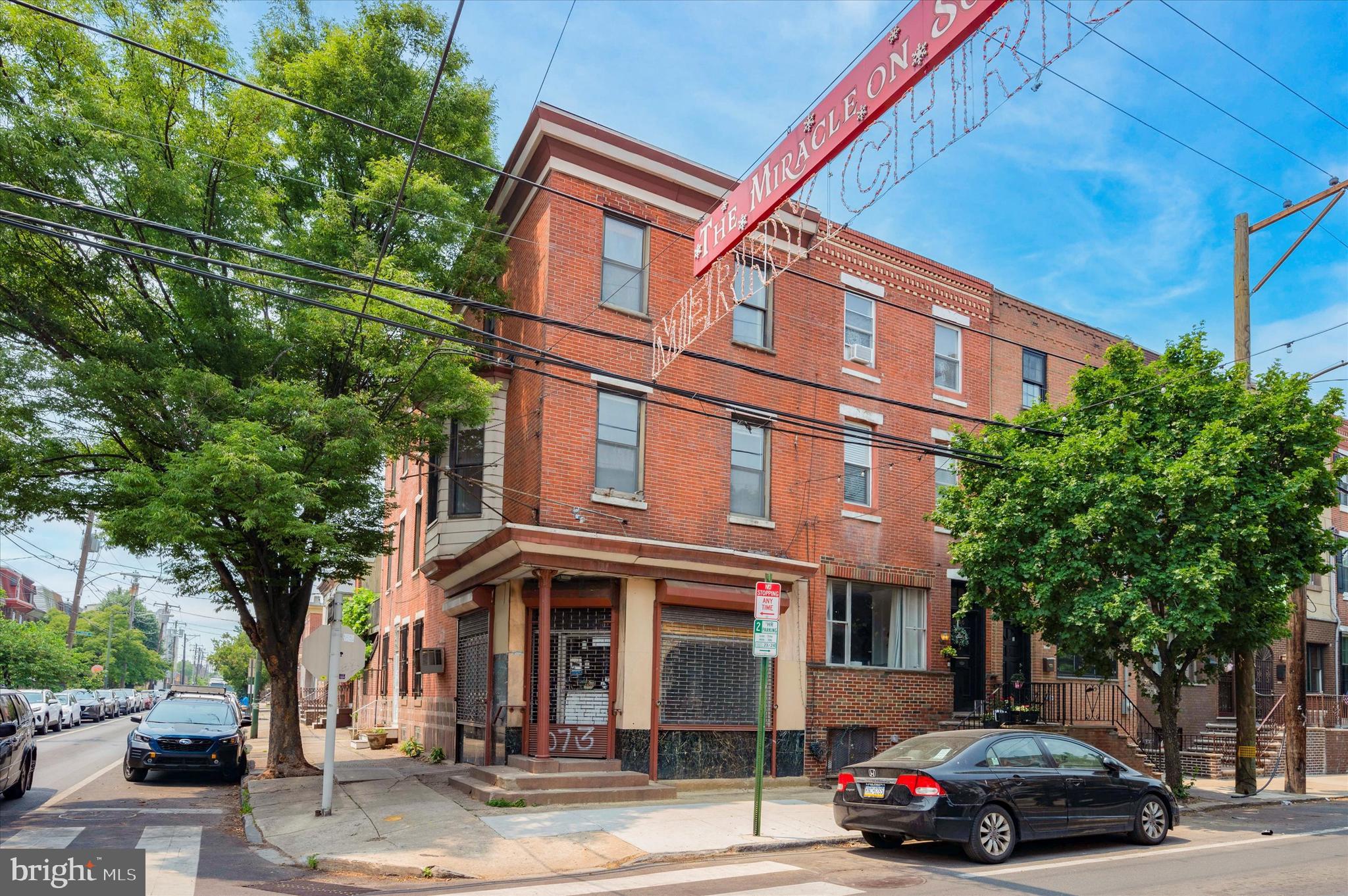 Welcome to this lovely bi-level rental located on one of the most iconic streets in East Passyunk! Situated on the renowned "Miracle on South 13th Street" block, this corner property exudes Old-World charm while offering a spacious loft-style feel with high ceilings and oversized South and Southeast facing windows!
This rental occupies the 2nd and 3rd floors and boasts an array of desirable features. The spacious living room greets you with a grand decorative fireplace mantel and elegant marble flooring, creating an inviting atmosphere. Adjacent to the living room, you'll find a formal dining room adorned with storage closets, a beautiful leaded glass window, and expansive archways. The quaint and sunny kitchen is equipped with stainless steel appliances, subway tile backsplash, garbage disposal, and a microwave…With access to an enclosed rear deck which displays a city skyline view, as well as a majestic fig tree and mature grape vine to provide refreshing shade.
Just beyond the ornate iron stair railing awaits the first windowed bathroom, featuring brass finishes, a bidet and glass-enclosed stall shower. As you ascend to the 3rd level, you'll discover three sizable bedrooms, each with ample storage space and an abundance of natural light. There’s a hall bathroom with ceramic tile, a bathtub with shower surround and storage options. Additionally, there is a bonus room adjoining the first bedroom, which will be converted into a convenient laundry area.
With an impressive walk score of 98, this property is a commuter’s dream! Ideally located just a block away from Passyunk Square, a vibrant neighborhood brimming with culture and exciting attractions. You'll find yourself surrounded by award-winning restaurants and bars, charming bakeries, cozy cafes, and stylish boutiques. Indulge in culinary delights at popular spots like Green eggs, Victor's Cafe, Mighty Bread, the James Beard award-winning Palizzi Club, Barcelona Wine Bar, and Bing Bing Dim Sum, just to name a few.
A quick stroll to serene Columbus Square Park and steps to the Tasker-Morris Broad Street Line station, ensuring a quick and convenient commute to Center City, Lincoln Financial Field, Citizens Bank Park, and the Wells Fargo Center! Don't miss the opportunity to call this charming bi-level rental your new home. Experience the perfect blend of historic allure and modern convenience in one of Philadelphia's most sought-after neighborhoods!
