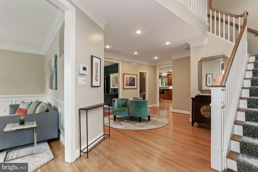 Open Sun 6/27 2p - 4p! Beautifully updated and maintained 6BR/4.5BA in sought after Country Club Hills. Main level features a spacious foyer that flows to a formal living room, private at home office, stunning dining room, gourmet kitchen with granite counters and stainless steel appliances and a light-filled family room with built-in book cases, a gas fireplace and opens to a private, flat backyard. Upper level features a stunning Master bedroom with two walk-in closets and updated, spa-like bathroom, guest room en suite, two additional bedrooms, an updated hall bathroom and spacious laundry room. The lower level has a two car garage that opens to a mud room, large recreational room, exercise/bedroom, additional bedroom, full bathroom and lots of storage. **Tax records do not reflect that total sq footage is 5,186**