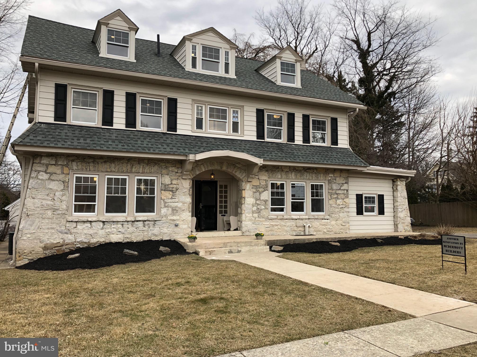 Stunning and spacious Center Hall Colonial in desirable Drexel Hill with everything new. Entering thru the front door the first thing you will see is a beautiful very wide staircase. On the right side of the home is a living room with hardwood floors and a wood burning fireplace. A doorway leads from the living room out to a nice size sunroom to relax in or use as an office or even a playroom. The other side of the home consists of a formal dining room with hardwood floors that lead into the spacious kitchen. Upon entering the kitchen to the right is a door leading to a powder room. The kichen is beautiful with plenty of cabinet space and granite counters.There are two sinks in the kitchen, one being a bar sink. The appliances are all stainless steel including refrigerator, gas 5 burner stove, dishwasher and microwave. There are exits off of the kitchen leading out to the backyard. Going up the beautiful staircase to the second floor you will find a large Master Suite with lots of closet space anda Master Bath with ceramic tile and shower stall with glass doors. The stainless steel washer and dryer are located outside of the Master bedroom. Two other nice size bedrooms and a ceramic tile hall bath complete the second floor. Third floor has two more bedrooms and a shared bath. The basement is clean and very spacious. Home has it's own driveway and a two car garage. Gas heat and central air are two zoned. basement and first floor are one zone and second and third floor are the other. This place has tons of space!! Make your appointment to come and see today.