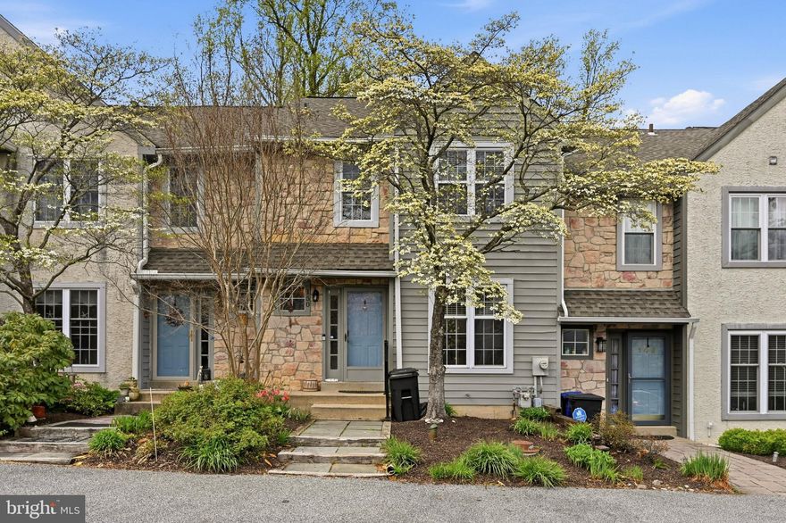 Welcome to 150 Nottingham Court, a beautifully maintained townhome tucked away on a quiet cul-de-sac in the highly sought-after community of Ballinahinch. Backing to wooded views, this home offers the perfect combination of privacy, comfort, and convenience. Step inside to a welcoming foyer with hardwood floors that flow seamlessly into the formal dining area. The sunken living room is filled with natural light and features soaring 10-foot ceilings, a cozy gas fireplace, and sliding doors leading to a private deck overlooking the peaceful tree-lined setting. The kitchen offers a functional, well-designed layout with ample cabinetry, complemented by a mix of appliances and plenty of natural light that creates a bright and inviting space, while all 2.5 bathrooms have been previously updated with tasteful, custom finishes. Throughout the home, you’ll appreciate fresh paint, new carpeting upstairs, updated light fixtures, and recessed lighting that create a bright, modern feel. Upstairs, you’ll find two spacious bedrooms, each with its own full bathroom, offering comfort and privacy for both owners and guests. A convenient second-floor laundry closet adds to the home’s functionality. The finished lower level offers exceptional versatility, ideal for a second living space, home office, gym, or guest area. A French drain system provides added peace of mind, and a water heater installed in 2022 adds to the home’s overall value. Enjoy low-maintenance living with a monthly HOA fee of just $140, covering lawn care, snow removal, trash, and common area maintenance. Two dedicated parking spaces are located in front of the home, with additional guest parking nearby. Ideally located just minutes from I-95 and Route 1, this home offers easy access to Philadelphia, Wilmington, and beyond. Nearby attractions include The Promenade at Granite Run, downtown Media, and the scenic Chester Creek Trail. The Elwyn Regional Rail Station, Philadelphia International Airport, and Center City are all within a short drive, making commuting a breeze. This move-in ready home truly offers the best of comfort, convenience, and lifestyle; don’t miss your opportunity to make it yours