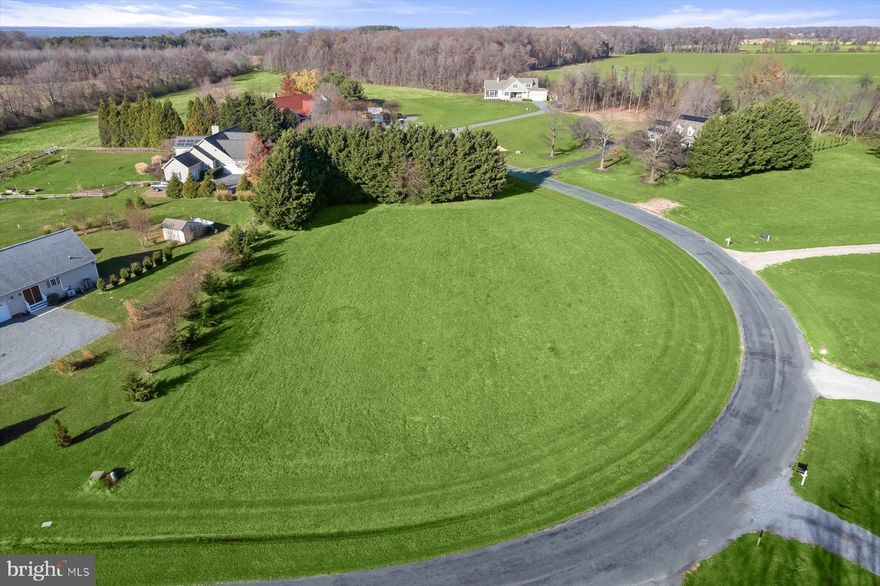 NEW PRICE- We welcome all offers! Welcome to Little Neck Farm - this waterfront community has 30 homesites within a 354 acre farm with 4 miles of protected shoreline and plenty of open space where  getting back to nature is possible.  Lot 30 is available for sale - it is a generous level one acre lot with plenty of room to build your dream or getaway home. The lot has evergreens and crape myrtle plantings  outlining a portion of the lots borders thereby creating some privacy between the adjacent homes. There are covenants and restrictions which are available upon request. This community is set up for a shared septic system which has been approved and specifications also available. Lot 30 has a deep water deeded boat slip on Swan Creek, with lights, electric and water and a picnic area for grilling.  To see the boat slips- from the lot- take a left onto Burris Road and follow to the end the parking and slips will be on the left side of the road.  Easy access to Rock Hall/Marinas and downtown Chestertown Buyer will need to drill  a well at their expense. Please do not walk onto the lot without an appointment. Lot 30 is located between 6890 and 6961 Hagy Road