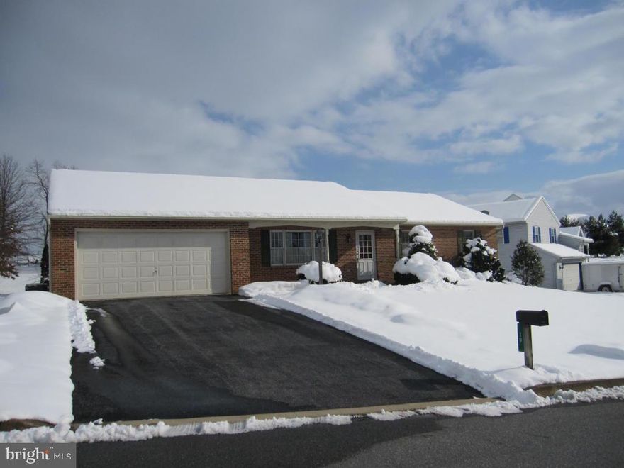 Newer brick Rancher. Easy one floor living; 3 BR, 2 Full Baths, large walk-out basement, 2-car garage. Situated on a large lot in a peaceful setting and quiet, dead-end street.