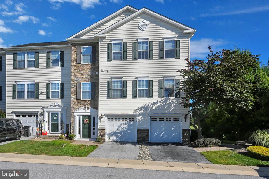 Excellent, former Model Home with open floor plan and many upgrades. Main floor features include a bedroom/office full bath, utility room and garage. Main level opens to stone patio in the rear. As you travel up the stairs you will find an open floor plan with plenty of natural light and includes a stone fireplace, upgraded kitchen, stainless steel appliances, covered rear deck overlooking the Community Common Area and walking trail. Primary bedroom features crown molding, wainscoting, walk in closets. Primary bath features a double sink vanity, Jacuzzi tub, shower stall. This level also has a full laundry room. This home is wired with a Smart Home System, which is included plus many more features. Seller will have carpets cleaned before settlement.  Sale subject to seller finding suitable housing.