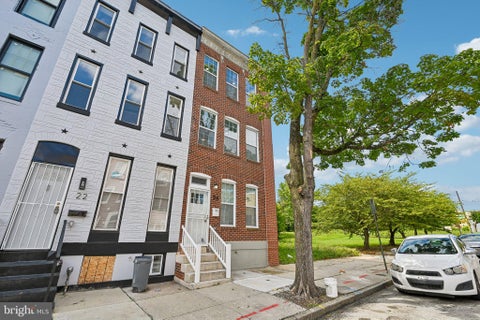 Photo of 24 N Gilmor Street, BALTIMORE, MD 21223 (MLS # MDBA2230594)