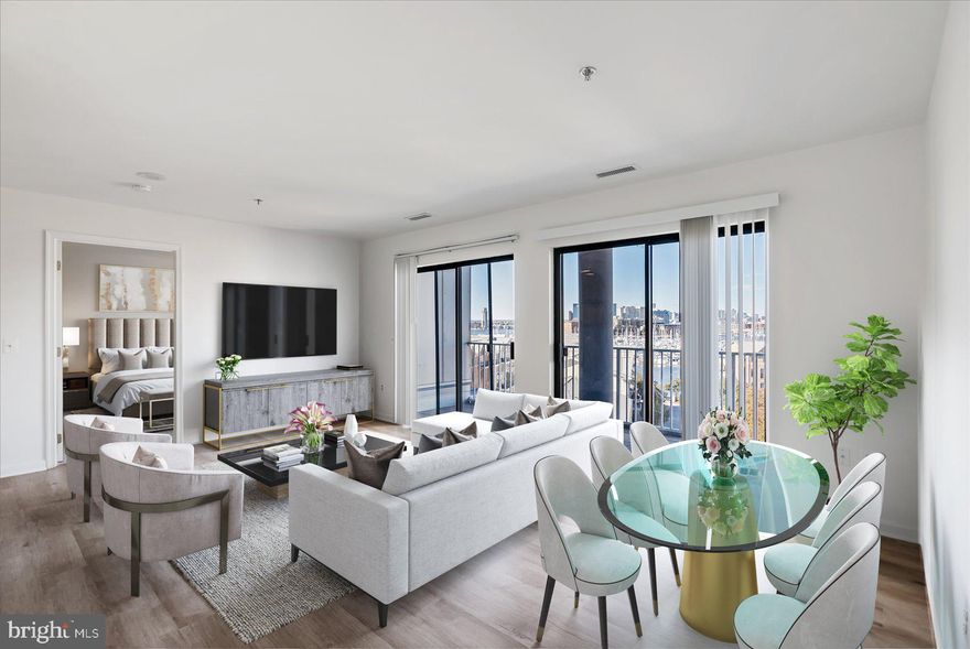 Extremely sought-after waterfront condo in the heart of Canton is waiting for you! This two-bedroom, two full bath condo is filled with natural light, an open floor plan, and spectacular Baltimore inner harbor views. Enjoy beautiful sunsets over Baltimore's harbor skyline while relaxing on your own expansive balcony. Freshly painted and new flooring throughout. You will be located within a short drive to Fells Point, Johns Hopkins Hospital, Harbor East and The Inner Harbor. You are also within walking distance to great restaurants, bars, grocery stores, athletic clubs, a swim club and shops. Lighthouse Point E building has a fitness center, 24-hour security, and a fantastic courtyard, perfect for entertaining guests. The unit comes with an assigned garage parking spot in addition to ample street parking. Convenient to all major routes including I-95.