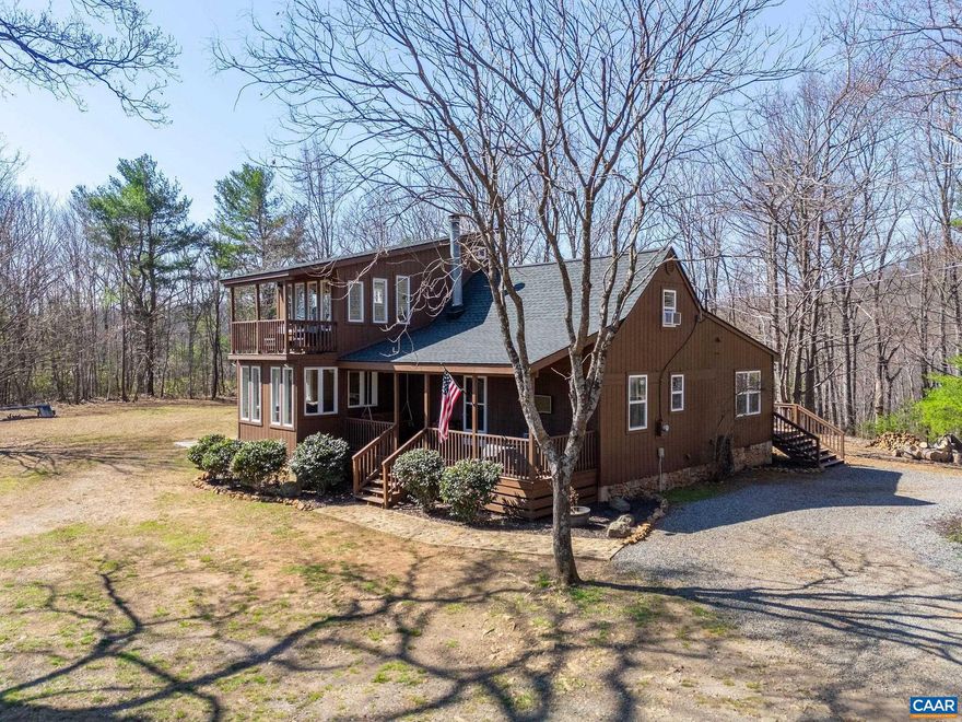 Welcome to your dream getaway at a mountaintop retreat, filled with plenty of natural light and outdoor space. Enjoy the hot tub, pool, and fire pit area?perfect for quiet relaxation away from the noise of everyday life. Soak in the hot tub while taking in the beautiful mountain views, take a dip in the pool, and unwind on the large deck or in the screened-in porches. This home features 3 bedroom one full and one half bath on main level.   The home features new windows, red oak floors, a wood stove, and a newer roof, making it just waiting for guests to arrive. This property is perfect for Airbnb short-term rentals and weekend getaways.   It's conveniently located just 20 minutes from Lydia Lodge and Cabins for dining and relaxation, 30 minutes to the Blue Ridge Parkway for hiking, and 40 minutes to Charlottesville for fine dining.,Wood Cabinets