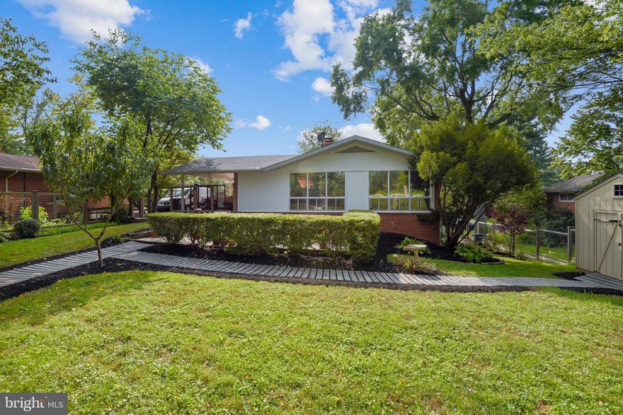 Wow!  Check out this home in great location!  Tenant has moved out.  BRAND NEW ROOF!  New gutters.  Freshly Painted.  New Carpet!  Updated Kitchen with granite counter top and stainless appliances including brand new stove and exhaust.   Lovely remodeled home w/ 2 BR & 2.5 updated baths on upper level and a full apartment on lower level with separate entrance, bedroom, den, full bath, living room, dining area, fireplace and kitchen.  Exquisite attention to detail.  Upper level master bedroom has a walk-in closet with built ins.  Master bath with dual sinks, water closet, shower with rainfall head, designer standing tub, blue tooth speakers & TV.   Second bedroom also has an updated en suite bath.  Rare property has a guest powder room with designer sink  on main level.    Tons of storage .  Relax in your charming fenced yard with patio & landscaping backing to wooded copse.  Huge front porch.  Carport & large driveway.    Lower level den can be easily converted into a 4th  bedroom.  This home is gorgeously updated and one of a kind!  Great option for Investor clients too.   Rental Value $3200+ for UL and Lower.  Lower Fairfax City tax opportunity, free trash and snow removal services, and no-HOA !  Minutes from downtown Fairfax City shops, restaurants and employment centers.