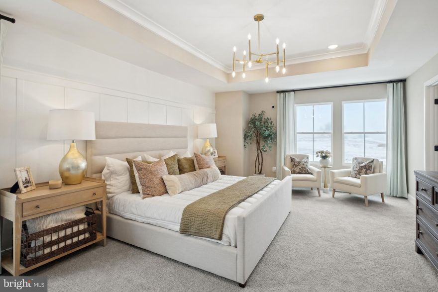 This home is under construction and estimated to be completed in May/June 2026! Welcome to Estates of Tuscarora, a brand-new community offering 1+ acre homesites within close proximity to commuter routes, shopping, parks, and Historic Downtown Martinsburg! The Canterbury 2-story colonial home located on a homesite #32 on 1.5 Acres. This 2-car garage, 5-bedroom, 3 bath home blends timeless Farmhouse interior design with modern convenience! Offering an open floor plan, this home is perfect for both comfortable living and entertaining. At the heart of the home is an inviting family room with a fireplace, seamlessly connected to the kitchen and casual dining area. The well-appointed gourmet kitchen features GE Profile Stainless Steel appliances with range, hood vent, built-in wall oven and microwave; complete with a spacious island with quartz countertops and a farmhouse sink. A finishing touch on the main level is a rare find – an extra bedroom and full bath on the main level, ideal for guests, in-laws, or a home office. The 2-story foyer leads to a boxed oak staircase with an open railing, creating an elegant focal point leading to the upper level. The upstairs includes a loft area, 3 secondary bedrooms, laundry room and spacious Primary Bedroom. The Primary Bedroom includes a walk-in closet, tray ceiling, and luxury bath with a frameless shower door and free-standing soaking tub. Don’t miss the opportunity to make this remarkable home your own! Only 3 miles from I-81! Call and schedule your personalized appointment today! Ask about our closing cost assistance with the use of KHovnanian American Mortgage! **Photos are of the decorated Canterbury Model Home and similar home/features and may not reflect current home finishes. Pricing, options, and promotions are subject to change without notice. See Sales Consultant for more information**