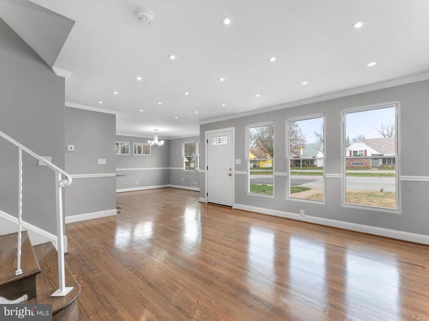 Beautiful rehabbed home!! New kitchen with stainless steel appliances and granite countertops. Hardwood floors throughout. This home has an amazing master suite on the upper lever, plus a lower lever and huge yard to relax in!!