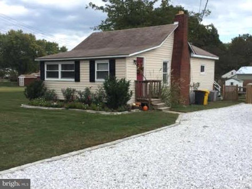 TURN KEY READY! Larger than posted sq footage!  Lovely renovation w/ open style floor plan!  It is larger than it appears! Master bedroom boasts crown molding & vaulted ceilings, the full bathroom has given the full upgrade w/ ceramic tiles & tastefully decorated. The family room with wood stove flows right to the large eat in kitchen. Backyard is fully fenced with deck on back