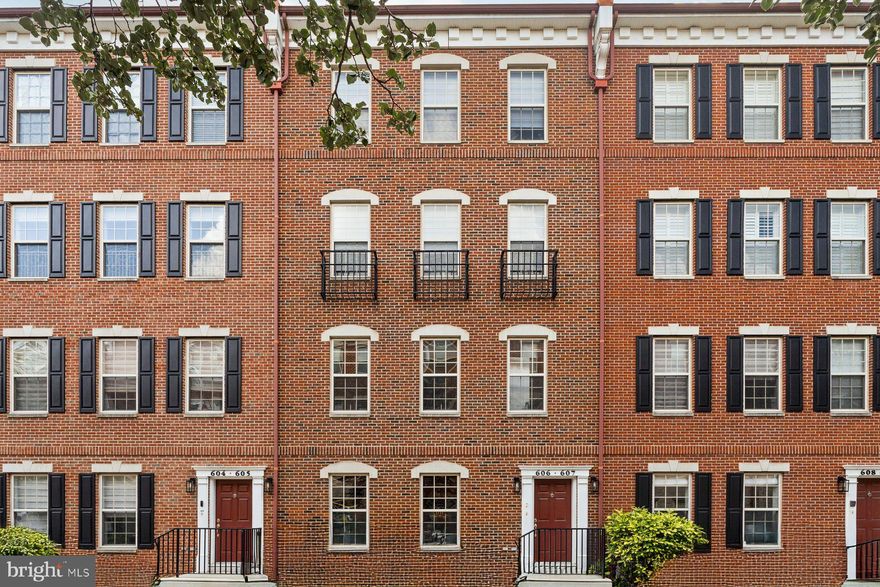 Welcome to 606 Admirals Way, a beautifully appointed 3-bedroom, 2.5-bath townhouse in Philadelphia’s premier gated community, Naval Square. This 1,850 sq ft home blends refined elegance with modern convenience. Enter through the foyer into an expansive open living and dining area, enhanced by rich hardwood floors, custom built-ins, and recessed lighting. The chef’s kitchen features stainless steel appliances, granite countertops, breakfast bar, and pantry. A convenient half bath on the main level and attached garage provide everyday ease.

Upper level, the primary suite features vaulted ceilings, a generous walk-in closet, and an elegant full bath with dual sinks. Two additional bedrooms share a well-appointed full bath, and one offers balcony access. 

Residents enjoy a full suite of amenities: gated entry, 24/7 security and concierge, fitness center, seasonal pool, community room, plus tranquil landscaped courtyards. Steps from Rittenhouse Square, Penn Medicine, UPenn, and Schuylkill River Park, this home is perfect for professionals seeking urban living with everyday comforts.