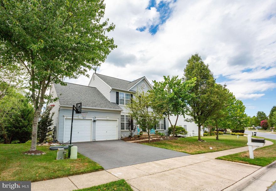 Welcome to this beautifully updated 4 bedroom, 3 full bath detached home in the much desired Greenview neighborhood in the Oakdale Schools district! Step into your two-story foyer with hardwood floors throughout the main level, an open and spacious but designated living and dining room, and a private office space. Your new kitchen has been fully updated with a large center island complete with seating for four, stainless steel appliances, upgraded countertops, and a farmhouse sink. Walk out onto your peaceful deck with electric awning that overlooks private conservation land and mature trees or step down into your cozy family room with a custom gas fireplace. Upstairs you will find 3 guest bedrooms, a full guest bath, and a large primary bedroom suite. In the primary suite are vaulted ceilings, two master closets and a large private bathroom with dual vanities and separate tub and shower. Downstairs in the fully finished basement with 9ft ceilings, is a full bath, multiple closet and storage spaces, a large bonus area with bar, and a media room with surround sound. Additionally the basement walks out to your covered backyard patio perfect for all your entertainment needs. This home has everything you need to move right in and relax, don't wait!