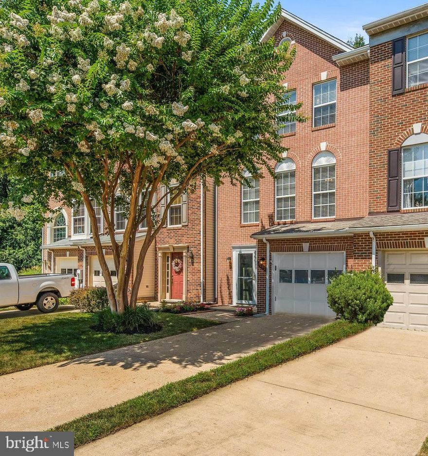 Beautifully updated and well maintained garage townhome in Aisquith Farms!  This 3 bedroom, 2 full and 1 half bathroom home offers updated tile bathrooms and a stunning designer kitchen!  The sun filled main level offers open floorplan perfect for entertaining and walks out to spacious deck with steps to lower yard.   First floor has back patio access, garage access, and rec room with fireplace!  Bedroom level with 3 generous bedrooms, master complete with soaring vaulted ceiling.  Short walk to community amenities, easy commuter access and convenient to restaurants, shopping and Downtown Annapolis!