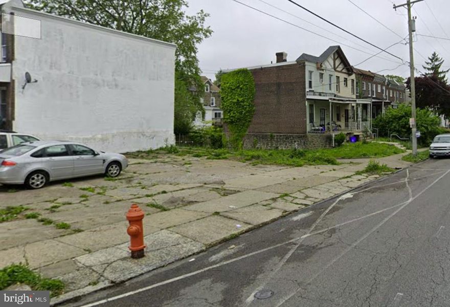 3,324 sq ft concrete-finished contractor yard on a high-visibility Germantown corner lot. Fully paved, low-maintenance, and ready for immediate use. Dual-street access ideal for truck/equipment maneuvering. Public sewer, RSA-5 zoning, fee simple. Quick possession available.