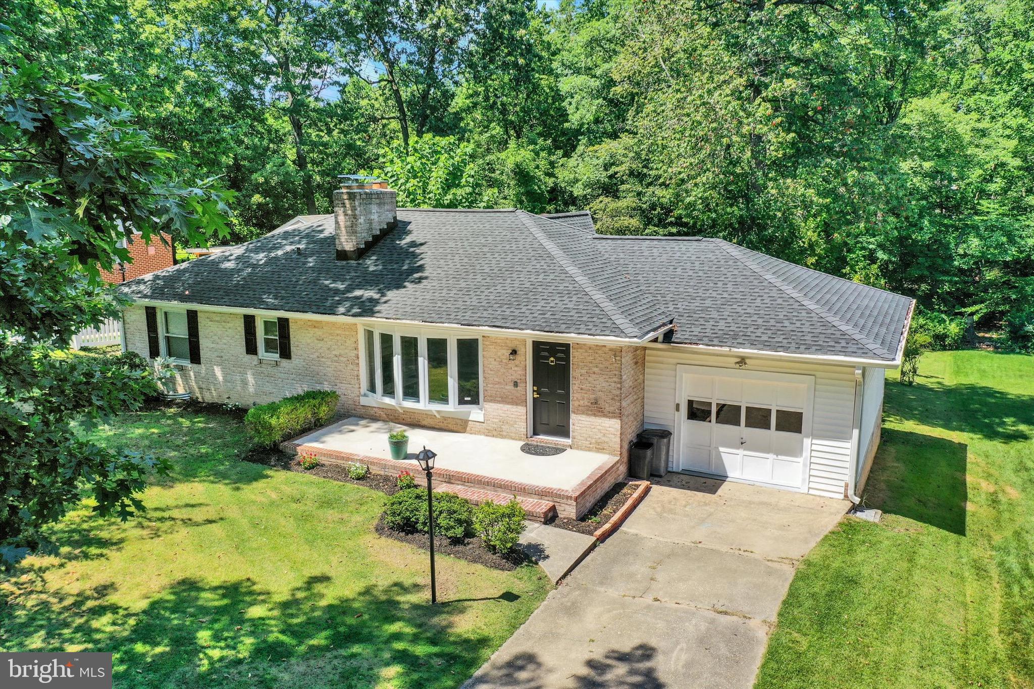 Move in ready! Featuring an outdoor entertaining area with a swimming pool, a bright and open interior, and a finished lower level for extra living space! Upon entry, the spacious living room is highlighted by a cozy fireplace and a bay window allowing plenty of natural lighting. Directly off of the living room is the kitchen with upgraded stainless steel appliances. A primary bedroom with an en-suite bath, and two additional bedrooms - one with its own private access to the jacuzzi, and full guest bath complete the main level layout. The lower level includes a spacious family room, a potential 4th bedroom, a laundry room and half bath. Don't miss this opportunity to own this nicely renovated home in Parkville, MD.