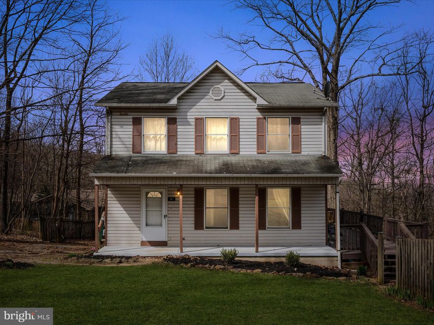 Nestled on a beautiful wooded lot, this charming 3-bedroom, 2.5-bath colonial offers the perfect blend of privacy and convenience. Step inside to a spacious family room that flows seamlessly into the dining area, where French doors lead to a stunning wrap-around porch—perfect for soaking in the peaceful surroundings. The kitchen features a gorgeous custom butcher block island, adding warmth and character to the heart of the home. Upstairs, you’ll find two generously sized bedrooms, a full bath, and a spacious primary suite with a large walk-in closet and attached bathroom. The basement offers a finished office or flex space, a workshop area, and plenty of storage. But wait—there’s more! Love the idea of fresh eggs in the morning? This property welcomes your feathered friends, so yes, you can bring your chickens and create your own little homestead! With a storage shed already in place and plenty of room to roam, this home is the perfect mix of country charm and modern comfort. Located just minutes from Front Royal, Route 522, the Appalachian Trail, and Shenandoah National Park, this home is the ultimate retreat. Don't miss your chance—schedule your showing today!