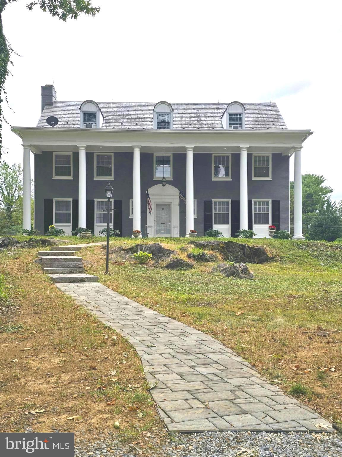 Take a step back in time in this all brick colonial 6 bedroom, 3 1/2 bath home with approximately 4000 square feet on .45 acres. Built in 1941 by Dr. Edward Kronenberg for his family, and has remained within a family members' possession since. First time offered to the public. Large living room with fireplace, large dining room, game room and butlers pantry and servants dining area on the first floor. 4 bedroom and 2 full baths o the 2nd floor, 2 bedrroms and a full bath on the 3rd floor. hardwood flooring throughout the entire home. Many original features remain. Modern heating and cooling; upgraded electric, full basement with integral garage. Bedrooms are spacious with plenty of storage throughout the home. Large closets for storage throughout the home.