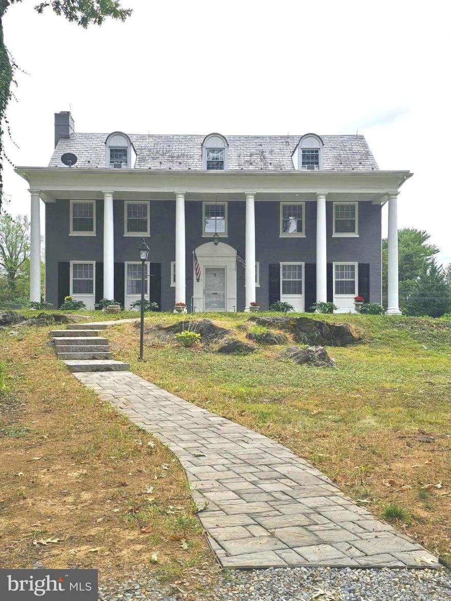 Step back in time in this all brick  colonial 6 bedroom, 3 1/2 bath home  with approximately 4000 square feet on .45 acres. Built in 1941 by Dr. Edward Kronenberg as a residence for his family, this home has remained within the family  possession ever since. First time offered to the public.  Large living room with fireplace, large dining room, game room and butlers pantry  and servants dining area on the first floor. 4 bedroom and 2 full baths o the 2nd floor, 2 bedrroms and a full bath on the 3rd floor. hardwood flooring throughout the entire home. Many original features remain. Modern heating and cooling; upgraded electric,  full basement with integral garage. Bedrooms are  spacious with plenty of storage throughout the home. Large closets for storage throughout the home.