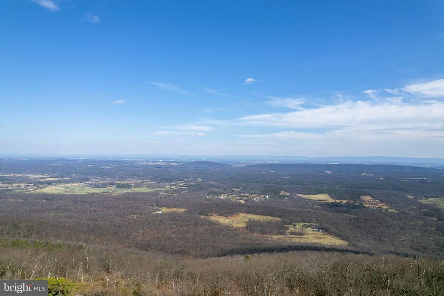 Breathtaking Views and Endless Possibilities! Discover your own slice of paradise on this stunning 20.05-acre property! With a 3-bedroom perc already in place, drainfield and distribution box installed, and electric at the property, you're just a septic tank away from breaking ground. Part of the lot is already cleared, making it the perfect spot to build your dream home, weekend getaway, or cozy cabin in the woods. Whether you're looking for wide open space, peaceful surroundings, or a private retreat immersed in nature, this property is ready to bring your vision to life! Professional photos coming soon!