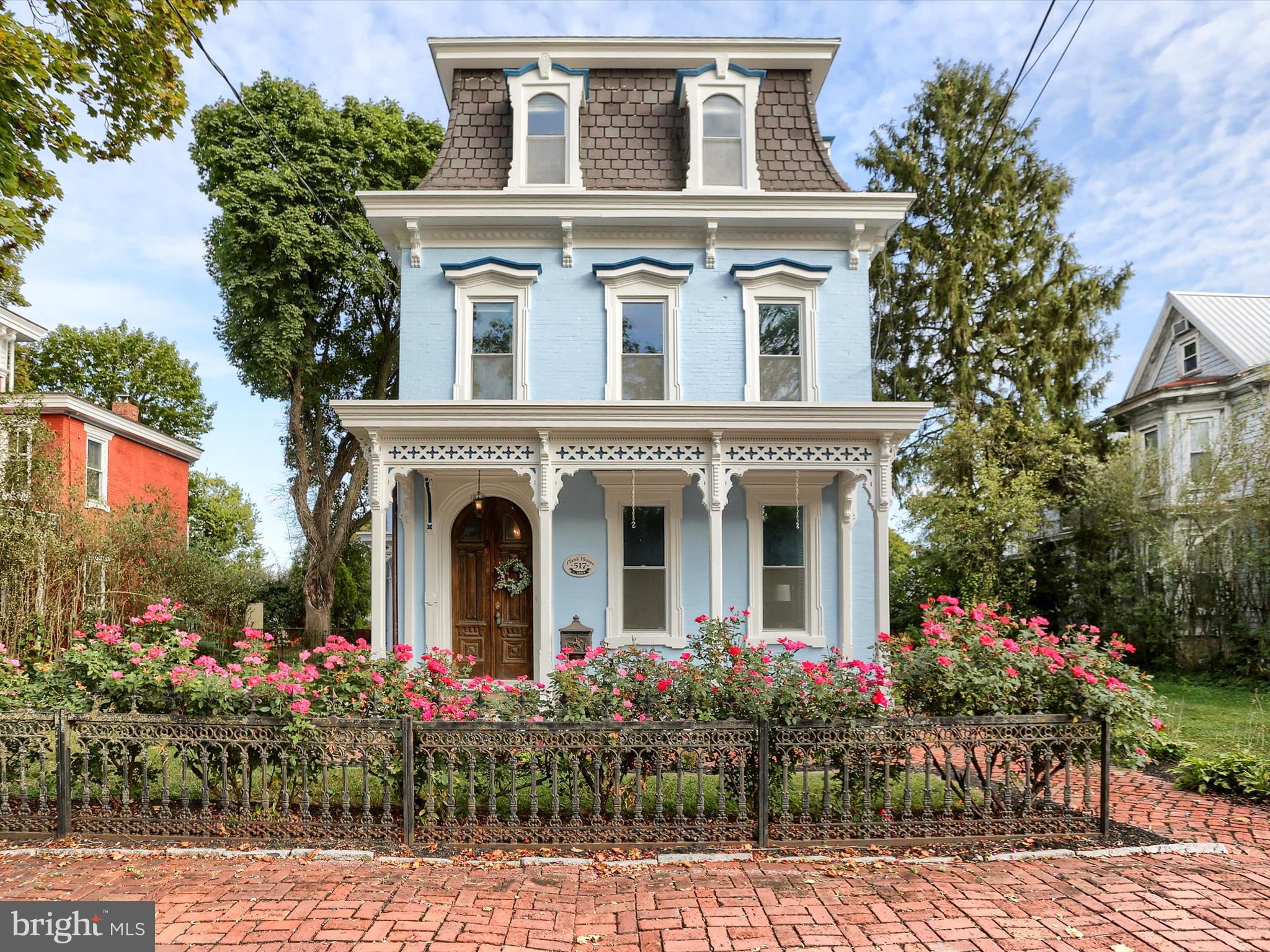 Step into timeless elegance with this beautifully maintained 1900 Italianate-style home offering 4 bedrooms, 3.5 baths, and over 3,100 sq ft of living space. Rich wood floors flow throughout, complementing an updated kitchen and thoughtfully renovated bathrooms. Convenience meets tradition with second-floor laundry located near the bedrooms. Recent upgrades include a new furnace, fresh exterior paint, and a rebuilt front porch authentically restored to its original architecture, along with a newly replaced railing on the back porch. Outdoors, enjoy a landscaped backyard perfect for relaxing or entertaining. A rare opportunity to own a piece of history that blends period charm with modern comfort.