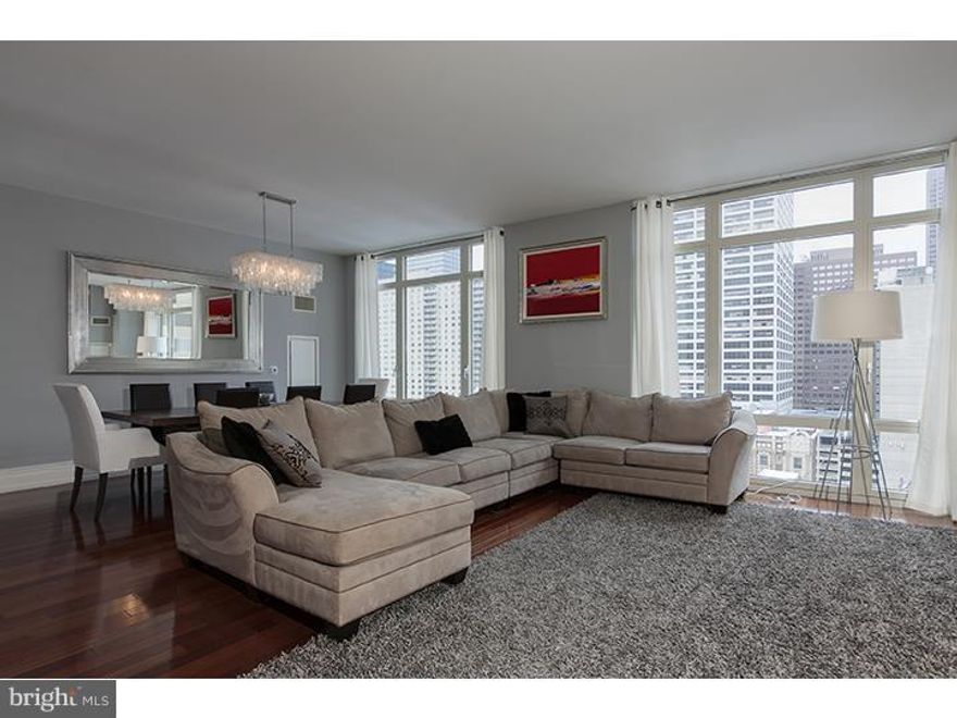 Stunning 2 Bedroom, 2.5 Baths Condo with City Views located in the unparalleled luxurious 10 Rittenhouse Square. Open Living Room/Dining Room with floor to ceiling windows. Kitchen includes Poggenpohl Cabinets, Granite, Sub-Zero Refrigerator and Viking Gas Cook Top. Spacious Master Bedroom Suite features marble bath, separate frameless shower and double vanity sink. This unit includes one parking space in the private parking garage located in the building. This full service building's amenities include 24 hour concierge and Doorman, chauffeur driven Mercedes, Indoor Pool, Fitness Center, Yoga Room and Sauna. Approximately 5 years remaining on tax abatement. Truly Luxurious living at its best.