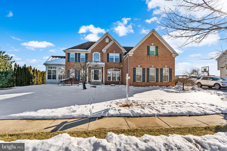 *Offer Deadline 2/26* Discover boundless space in this impeccably designed Colonial home. You're greeted by a grand 2-story foyer & hardwood floors. The 1st floor offers an ideal layout of dedicated spaces & open concept. The office, complete with glass panel French doors, provides the perfect space for productivity. Entertain in the living room or relax in the solarium, boasting a tray ceiling & floor-to-ceiling windows that flood the room with light. The large kitchen will please those who love to cook or host, featuring 42” cabinets, a center island, Corian countertops, stainless steel appliances including a double wall oven, & a pantry. Enjoy casual dining in the breakfast room w/ skylights or out on the deck for alfresco dining. Unwind in the large Great Room boasting a vaulted ceiling & floor-to-ceiling stone gas fireplace & 2nd staircase. The main level is completed by an updated half bath, a laundry room & a mudroom off the 3-car attached garage, offering practicality & convenience. Upstairs, the primary bedroom awaits through French doors, featuring a tray ceiling, a sprawling sitting room and a 5-piece ensuite bath with a glass surround shower, jacuzzi tub, & double walk-in closets. 3 additional bedrooms &  a beautifully updated bath complete the 2nd floor. The finished basement offers even more space with a game room, theater room, exercise room, additional office and bath. Near restaurants, shopping, & easy highway access for commuting, this home truly has it all!