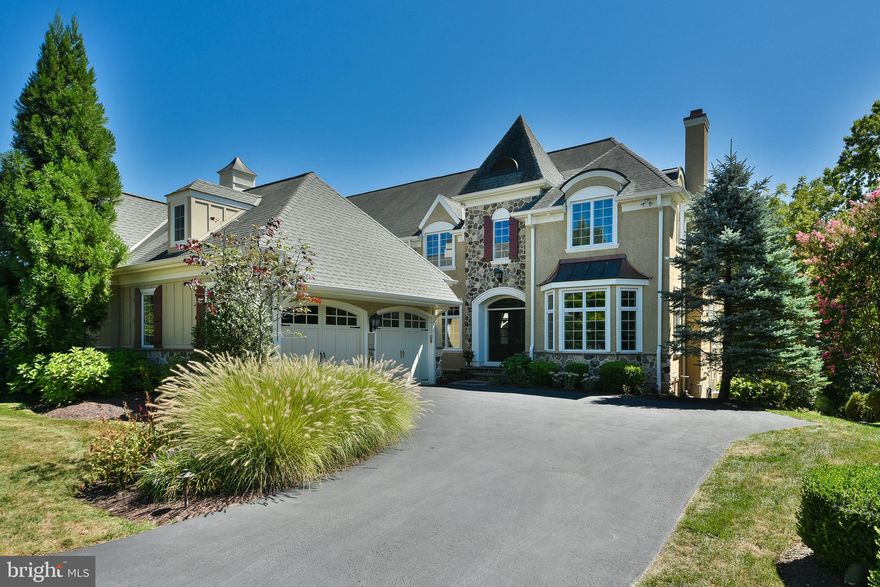 Original owners who lovingly customized this upscale Pembrey model are moving on. Here is your chance to own an upgraded home on a coveted premium lot backing up to 124 Acres of the Haverford Woods Preserve, with recreation, walking and biking trails, and your own personal Southbrook Trail access. This trail connects to more than 6 miles of walking trails in the community for your enjoyment. Haverford Reserve is a maintenance-free community on the Main Line. Pull up to this 3 Bedroom 3/1 Bath stone and stucco European Carriage House. This Pembrey has 4,176 sq ft on the upper floors and an additional 1,184 square feet on the finished lower level. Walking past the two-car attached garage you'll alight the front steps and enter through the double doors to your grand two-story foyer with sweeping staircase to the second floor. Traverse the foyer's gleaming travertine floors. The owners upgraded this home to have hardwood flooring on the first and second floors. To your right, you will find the light-filled formal Living Room with a gas-burning fireplace, and beautiful trim and moldings.  This airy home features 9ft ceilings, beautiful moldings and millwork, arched openings, and rounded drywall work for a polished finish. A gracious Dining Room with a tray ceiling and bay window is perfect for family get-togethers or entertaining. As you move past the Elevator and first-floor powder room, you will come to the rear of the home with a spacious Family Room with a vaulted ceiling, gas fireplace, and views of the woods beyond.  Off the Family Room a well-appointed Office / Den for privacy. A cook's dream awaits with a well-appointed chef's kitchen, abundant cabinetry, a center island with seating, and granite countertops. Off the Kitchen a Breakfast area and double doors to your newer Trex Deck complete with retractable awning! Take a gander over the rail at your fenced-in yard and Hot Tub ready for the summer season! Back inside, pass by the Kitchen to your Pantry and Mudroom before entering your massive attached garage. There's more, let's head down the elevator or stairs to the lower-level daylight basement. The owners opted for additional windows and light to pour into this multi-purpose space with custom built-ins, a bar area, a full bathroom, and an additional bedroom ( currently being utilized as a gym). In addition, an abundance of storage in an unfinished space that hosts your HVAC, Upgraded Electrical, Generator, Sprinkler, and Security Systems.  While the association maintains a sprinkler system for the front laws, this owner opted to sprinkle his entire yard. This property has three 3 handlers for this three-story home; 1 for the basement, one for the first floor, and one in the attic that services the second floor.  From here let's take the elevator up to the second floor. Here your Bedroom level awaits you with a Main Bedroom Suite with a custom outfitted walk-in closet and spa bathroom. Two additional bedrooms share a Jack & Jill Bath. There's more. Current owners appealed successfully the taxes to the new assessment of $822,500. These owners have an additional garage around the corner on Green Lane for $30 per month. Make an appointment today!