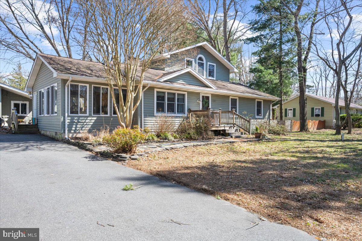 Your Dream Eastern Shore Retreat Awaits!
Welcome to this meticulously maintained home, where charm and comfort blend seamlessly. Whether you're savoring peaceful nights or hosting lively gatherings, this home offers the perfect setting.
Step into the breathtaking four-seasons room, where natural light pours in, highlighting an authentic reclaimed barn wood accent wall—crafted from the family’s 1930s farm in Kennedyville. Just beyond, a spacious two-car garage provides convenience, while the backyard invites endless enjoyment with an above-ground pool, a deck, and a cozy fire pit.
Inside, the galley kitchen boasts white cabinetry, granite countertops, and stainless steel appliances. Adjacent to the kitchen, a warm and inviting den features a wood stove, abundant natural light, and a spiral staircase leading to the private owner’s suite. The front of the home offers a welcoming sitting room, along with three comfortable bedrooms, a full hall bath, and a convenient laundry closet—all on the first floor.
Upstairs, the expansive owner’s suite is a true sanctuary. Enter through a charming foyer into a space filled with natural light from grand portrait windows. Enjoy the oversized walk-in closet, vaulted ceilings, and a private balcony, plus a versatile nook ideal for a desk, workout space, or cozy reading corner. The ensuite bath is a spa-like retreat, featuring a jacuzzi tub, separate shower, dual sinks, and soaring ceilings.
This Eastern Shore gem offers a lifestyle of comfort, character, and unforgettable moments. Don’t miss your chance to make it yours! Walk to the water, spend weekends in downtown Chestertown at the famous farmers market, shops or restaurants. Watch a game at Washington College, take a kayak out on the river or make a day trip to Easton, St. Michaels, Chesapeake City or Delaware. This property has everything you could want and No HOA.
We have a quote for an alternate staircase install if the spiral staircase isn't your style.
Seller is motivated and ready to pass this well maintained home to the next owners just in time for summer!