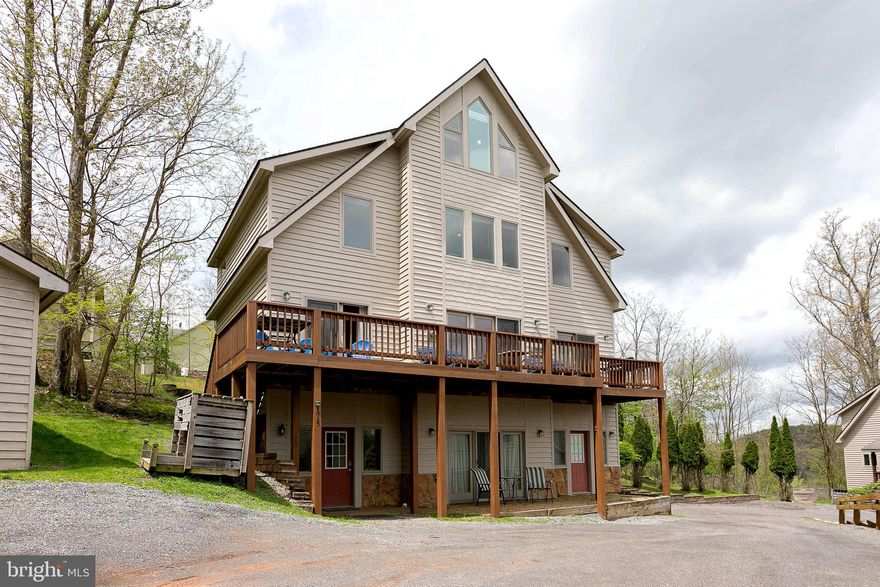 Welcome to one of the most spacious and inviting homes in Trader’s Landing. This rare stand-alone property offers more than 3,100 square feet of living space spread across four beautifully designed levels,  perfect for gathering with friends and family or finding a quiet spot to unwind.

With 4 bedrooms and 4.5 baths, there’s plenty of room for everyone to relax comfortably. Step out onto the upper deck to enjoy peaceful lake and mountain views, or head down to the lower patio for a soak in the hot tub after a day on the slopes or out on the water.

Located right in the heart of Deep Creek Lake, this home is close to restaurants, shopping, and endless outdoor adventures. It’s easy to see why homes like this in Trader’s Landing rarely come on the market — they offer the ideal blend of space, privacy, and convenience.

If you’ve been waiting for a Deep Creek home that truly has it all, this is your chance. Schedule your private showing today and come see what mountain living feels like at its best.