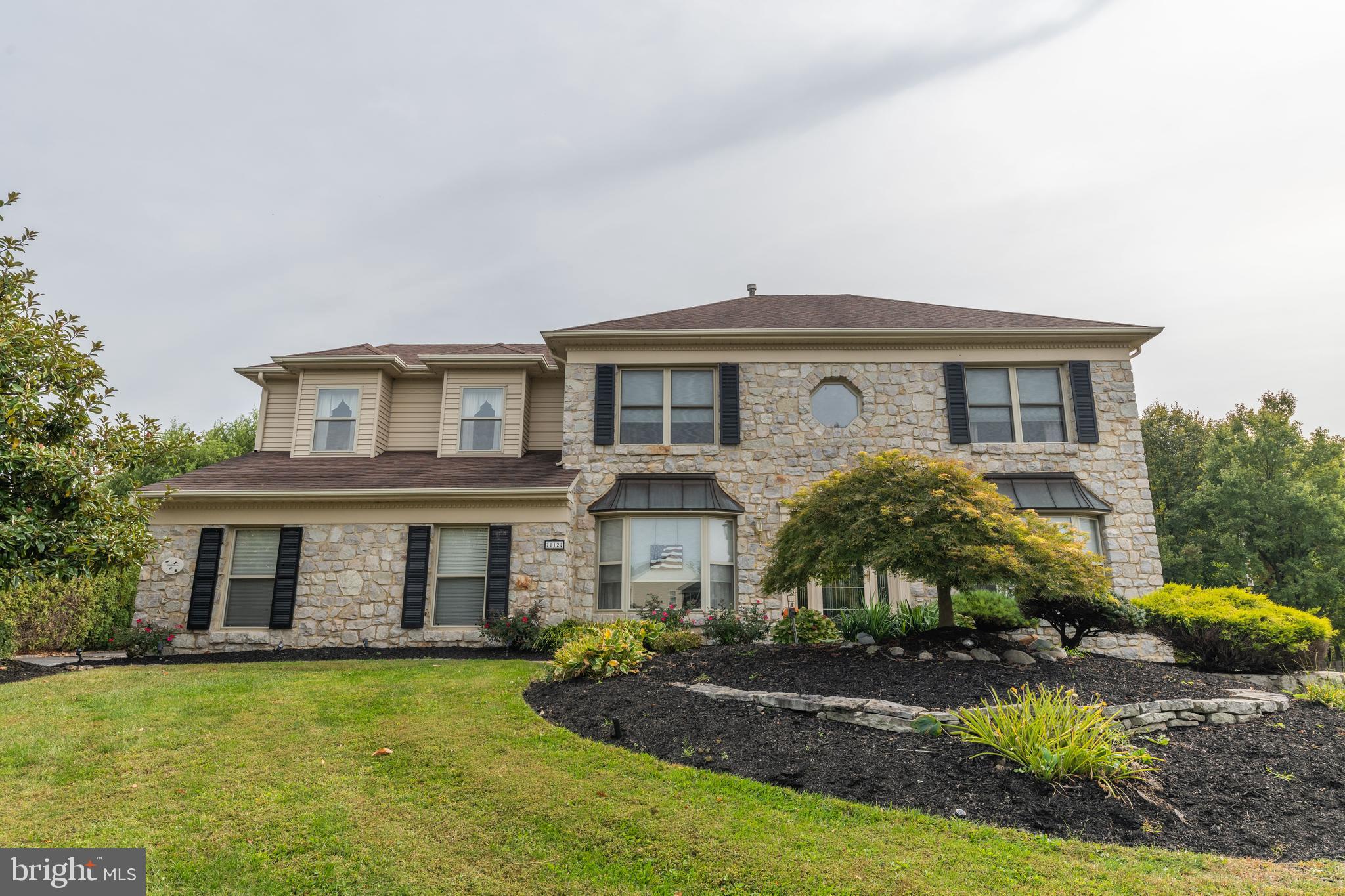 Introducing this stunning 4-bedroom, 2.5 bathroom Montgomeryville single family colonial. This property features a built-in oversized 2-car garage as well as a massive detached 2-car garage. Perfect for those that need extra garage space! Walking up to the home you will fall in love with the mature landscaping, extensive hardscaping and stone encrusted exterior. Enter the home through the 2-story foyer finished off in gleaming hardwood flooring. The family room has crown molding and opens into the dining room. The formal dining room is complimented by two tone neutral colors, crown molding, chair rails and hardwood flooring. The eat-in kitchen features hardwood flooring, backsplash, upgraded cabinets, kitchen island, dishwasher, gas range, built-in microwave and a hutch bar area. The family room has a vaulted ceiling, neutral paint, tons of windows, back yard access, gas fireplace, built-in speakers, skylights and access to the half bath, laundry and garage. Additionally in the front of the home there is a den, that can easily be used as a formal office. On the 2nd floor we have a massive master bedroom with a walk-in closet, supplementary closet, ceiling fan and a fully updated ensuite with tiled flooring, huge soaking tub, stall shower and double vanity. There are three additional large bedrooms serviced by a full updated bathroom as well. The full basement is huge and has a large storage room. In the back of the property there is a new storage shed, concrete patio and deck. There is a full irrigation system and site lighting for the trees. This home is considered to be in one of the best locations, being that it is a central pivot point to all major roadways in every direction and is also close to public transportation, restaurants, parks, schools and shopping. I promise you this amazing property will not last on the market long. Make an appointment today before it is too late!