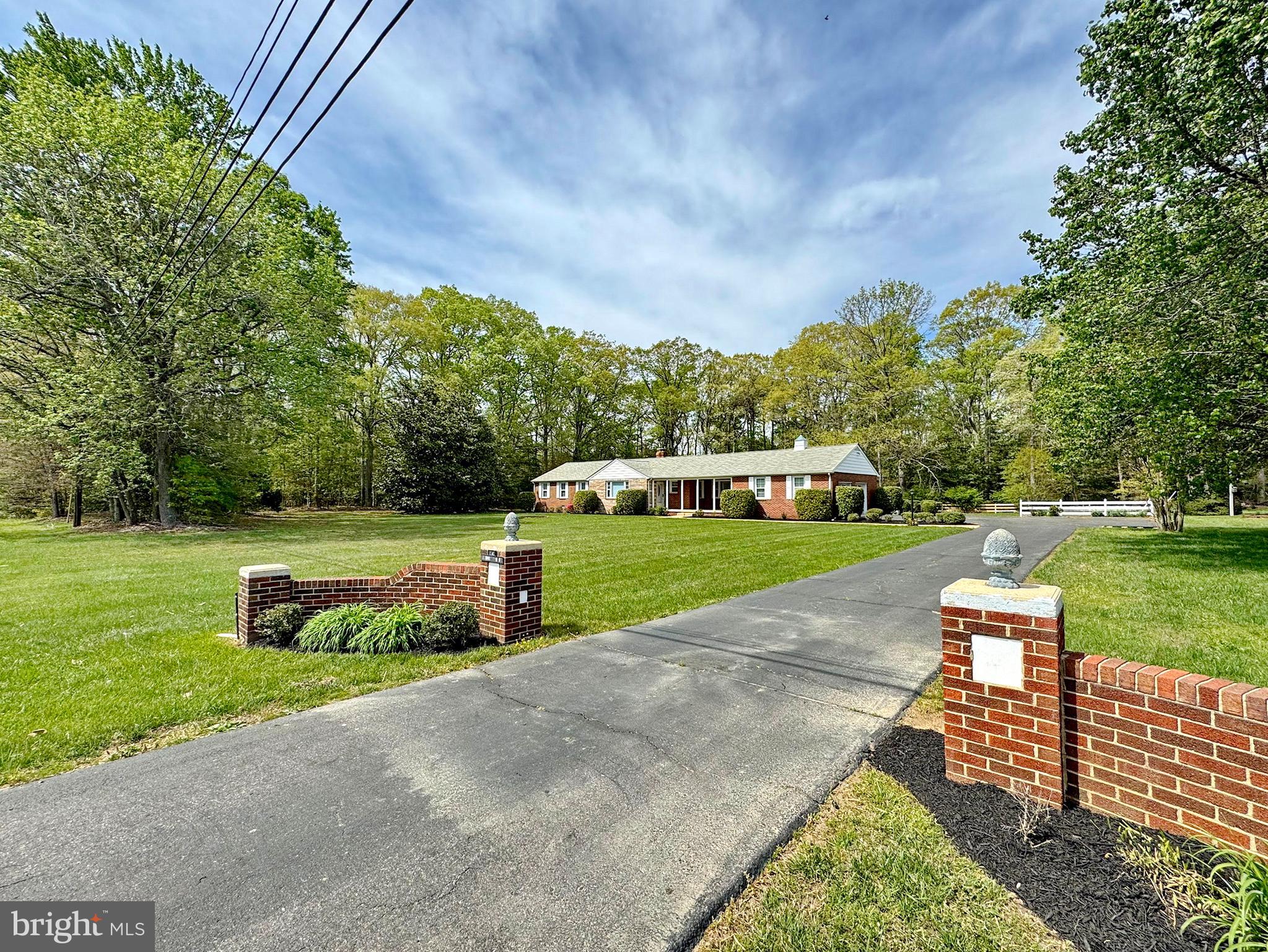 Newly Renovated Spacious 4 Bedroom/2 Bath Rambler Situated on 1.8 Acres +/- in Bryantown. Classic Kitchen with Eat-In Dining Area, Recessed Lighting, and New Appliances. Home Layout Offers Cozy Living Room with Fireplace as well as Oversized Family Room off Kitchen for Relaxing or Entertaining. Primary Bedroom Offers Two (2) Closets and Attached Primary Bathroom. Two (2) Car Attached Garage and Detached Garage Provide All of the Storage You Could Need. Home Connected to Back-Up Propane Generator So You Never Have to Worry About Losing Power. Don't Miss Out on This Opportunity for Single Floor Living! The property has a new well and the old well be abandoned . The crawl space has been remediated .and new insulation installed. The attic was also remediated and new insulation installed.