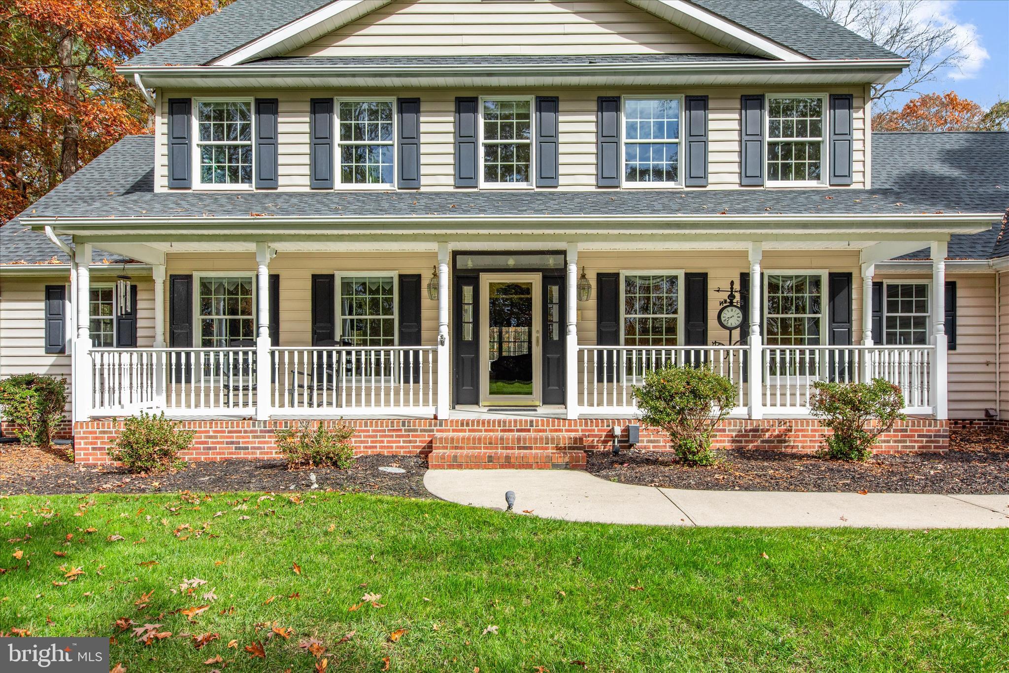 14 WHISPERING WOODS DRIVE