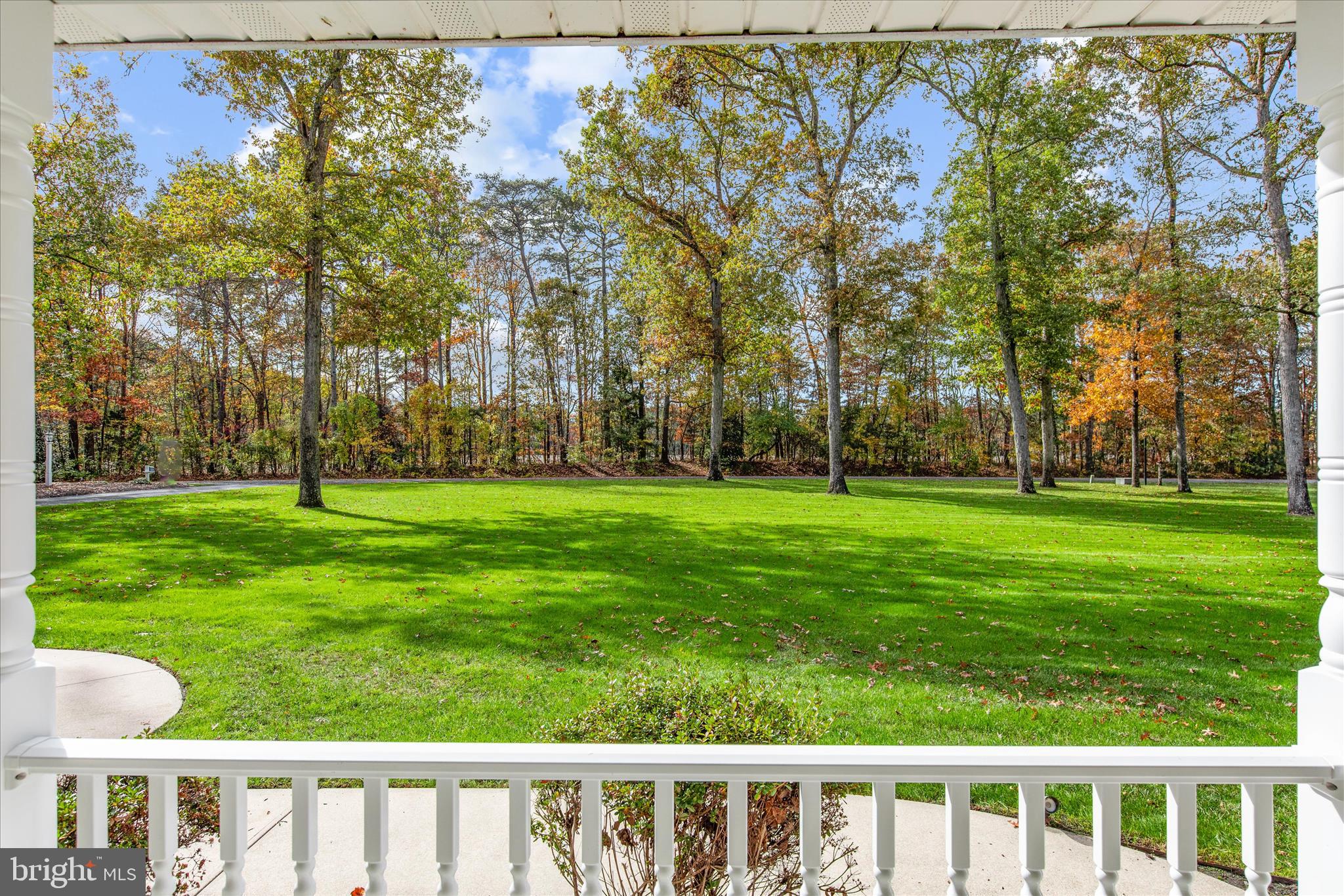 14 WHISPERING WOODS DRIVE