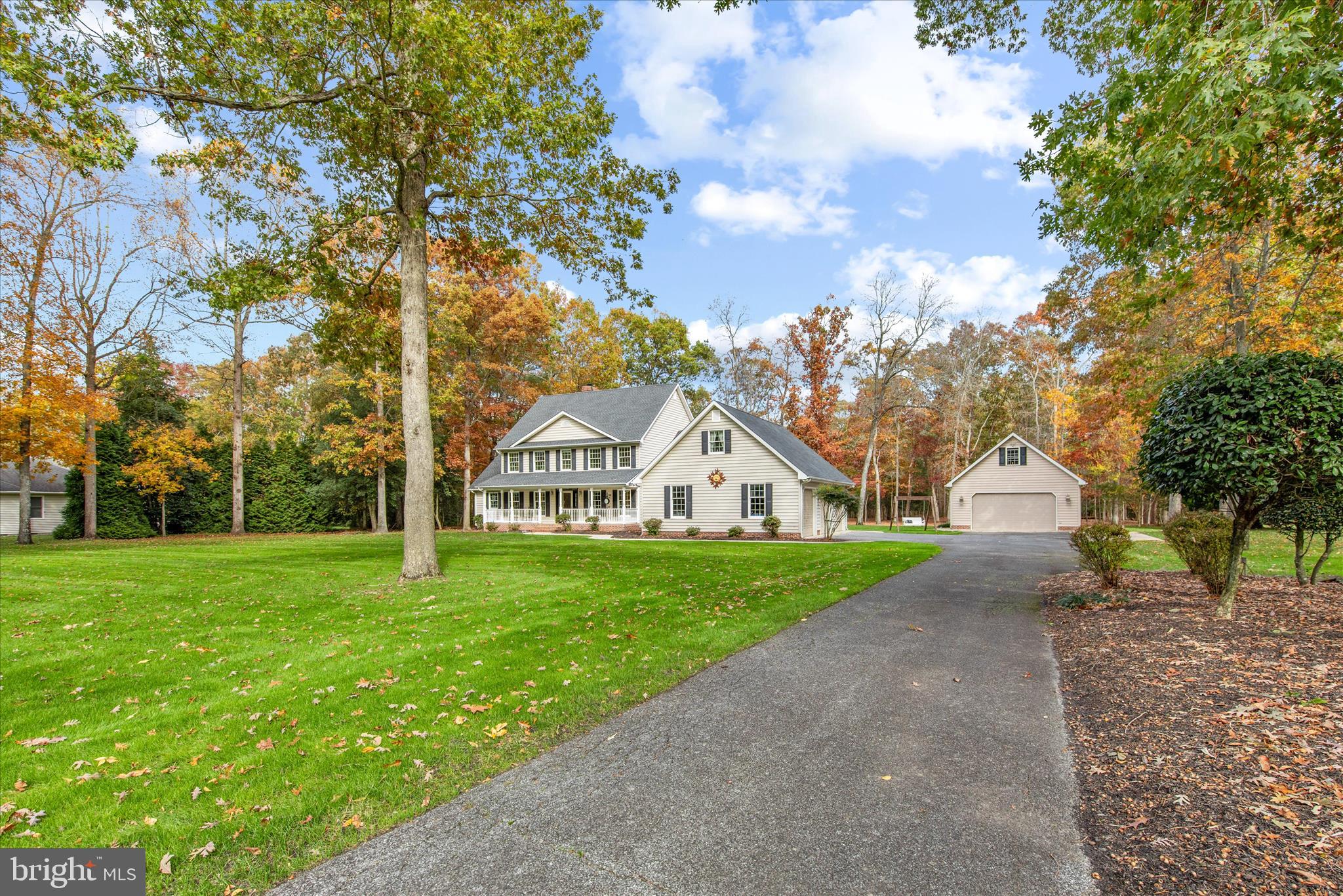 14 WHISPERING WOODS DRIVE