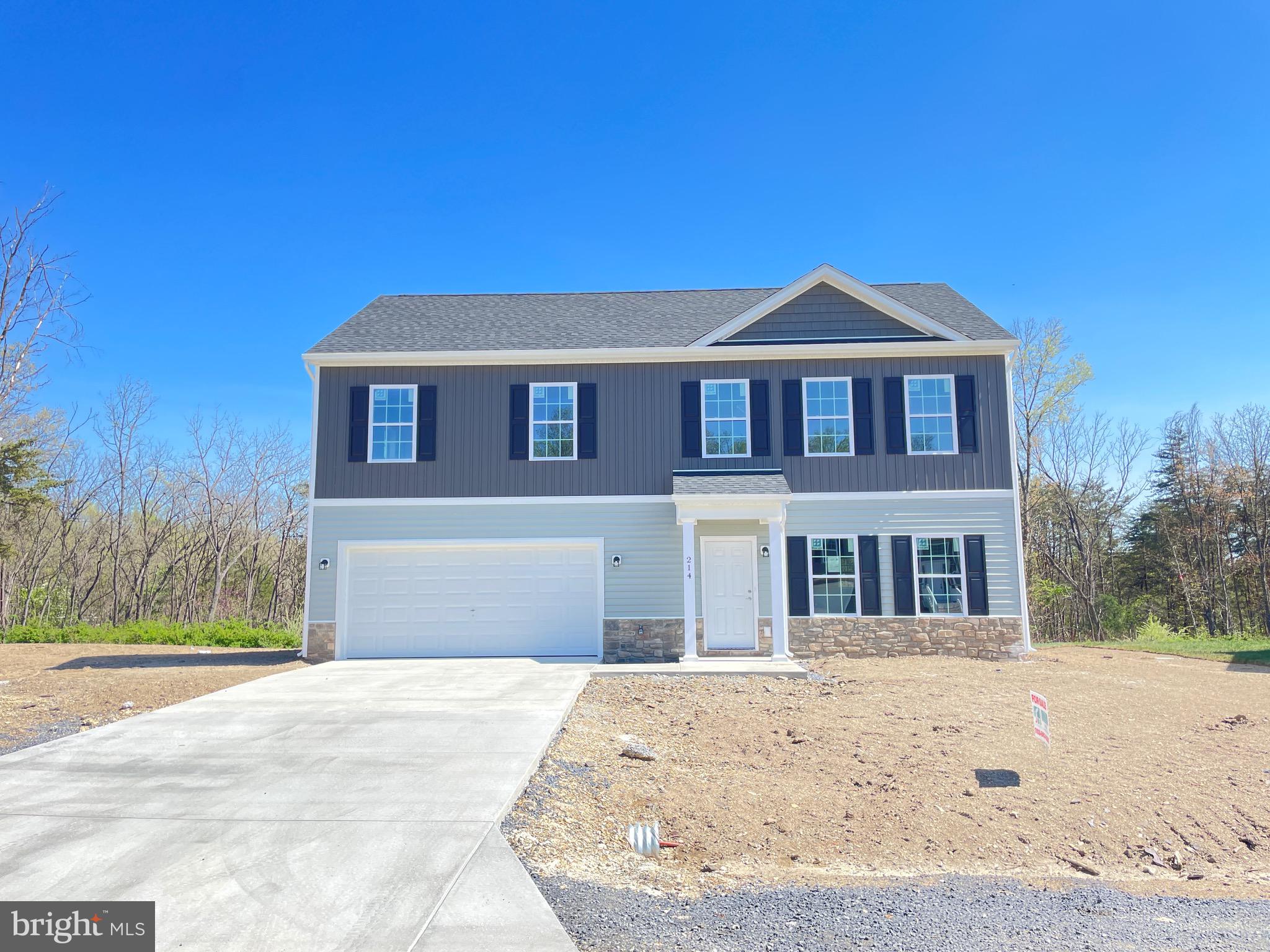Brand new and ready to sell. Up to 3% ($11,250) toward buyers closing costs and you can use the lender of your choice. This spacious 2,064 sq ft colonial features 4 bedrooms, 2.5 baths. Enjoy an open kitchen with stainless steel appliances and quartz countertops along with a generous sized family room that'll be perfect for entertaining. Upstairs features a large primary bedroom with a walk-in closet and en-suite bath. There are 3 more bedrooms and an additional full hall bath. Outside you'll find a large concrete driveway, 2-car garage and flat backyard that backs to trees.