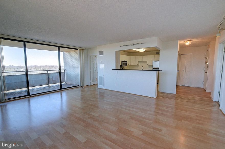 Indulge in the exclusive living experience offered by the only two-bedroom, one-and-a-half bathroom apartment available in the prestigious Promenade. This unique corner apartment, bathed in sunlight, spans 1250 square feet and boasts a chef's kitchen, wood floors, and an expansive private balcony with panoramic city and landscape views. The apartment is freshly painted, cleaned, and ready for immediate move-in.

The rent covers all utilities, even basic cable TV, for a comprehensive, worry-free living experience. Moreover, the package includes an assigned indoor parking space for added convenience.

The resort-style Promenade complex features a multitude of amenities to elevate your lifestyle. From indoor and outdoor pools, a state-of-the-art exercise and fitness center, sauna, and hot tub, to a vibrant retail arcade featuring a popular restaurant, beauty salon, dry cleaners, travel agency, and convenience store. The Promenade prioritizes your safety with a 24-hour service desk and a security gate at the building entrance.

As a resident of the Promenade, you'll have access to a wide array of on-site activities, including exercise classes, clubs, movie nights, and holiday parties. Sports enthusiasts will appreciate the seven tennis courts and pickleball courts available. The Promenade also offers eco-friendly facilities, such as electric car charging stations and self-car wash stations, along with ample guest parking.

The complex's prime location near I-270, I-495, downtown Bethesda, Pike & Rose, NIH/Walter Reed/Medical Center, and the Red Line Medical/NIH subway stop ensures convenient access to essential amenities. The Red Line Metro Ride-On Bus provides a direct link from the Promenade's front door to the Medical Center Metro Stop. The nearby Wildwood Shopping Center is home to a CVS, Giant, banks, restaurants, and Balducci's Gourmet Food Market.

This offer represents a unique opportunity to secure a luxurious living experience in the only two-bedroom, one-and-a-half bathroom apartment at the Promenade, complete with breathtaking views and unmatched amenities. A minimum one-year lease is required, along with a satisfactory credit check. Don't let this rare opportunity slip away; seize it today!