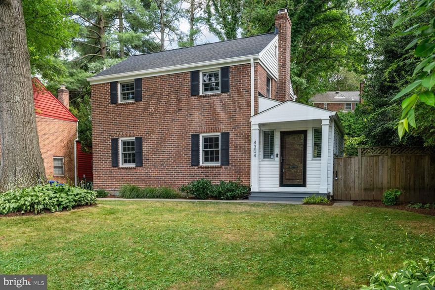 Welcome to this charming, updated East Bethesda colonial, located within a few minutes’ walk to Metro, shops, and restaurants. A block away you will find Lynnbrook Park with playground, ball fields, and tennis courts. Enter this lovely home from the covered front porch into a light-filled foyer with built-in shelves, large closet, and French doors to the rear patio. The main level offers a large living room with wood-burning fireplace, a separate dining room, a mud room with built-in cabinets, and a powder room. At the rear you will find a huge updated kitchen and family room, with cathedral ceiling, 2 skylights, and French doors to the patio. The kitchen has a breakfast bar at the large island, stainless appliances, and a side door opening directly to the driveway. Upstairs, there are 3 bedrooms and an updated hall bath with shower. Both the main and upper levels have hardwood flooring. The finished lower level with luxury vinyl plank flooring has a large recreation room with 2 closets and built-in shelves, a full bath with shower, and a laundry room/workshop. Updates include the renovated upstairs bath (2017), attic foam insulation and flooring (2017), a new sewer line to the street (2018), new roof, gutters and skylights (2019), new washer and dryer (2020), and basement flooring and waterproofing (new front window wells, French drains, and sump pump, 2021).