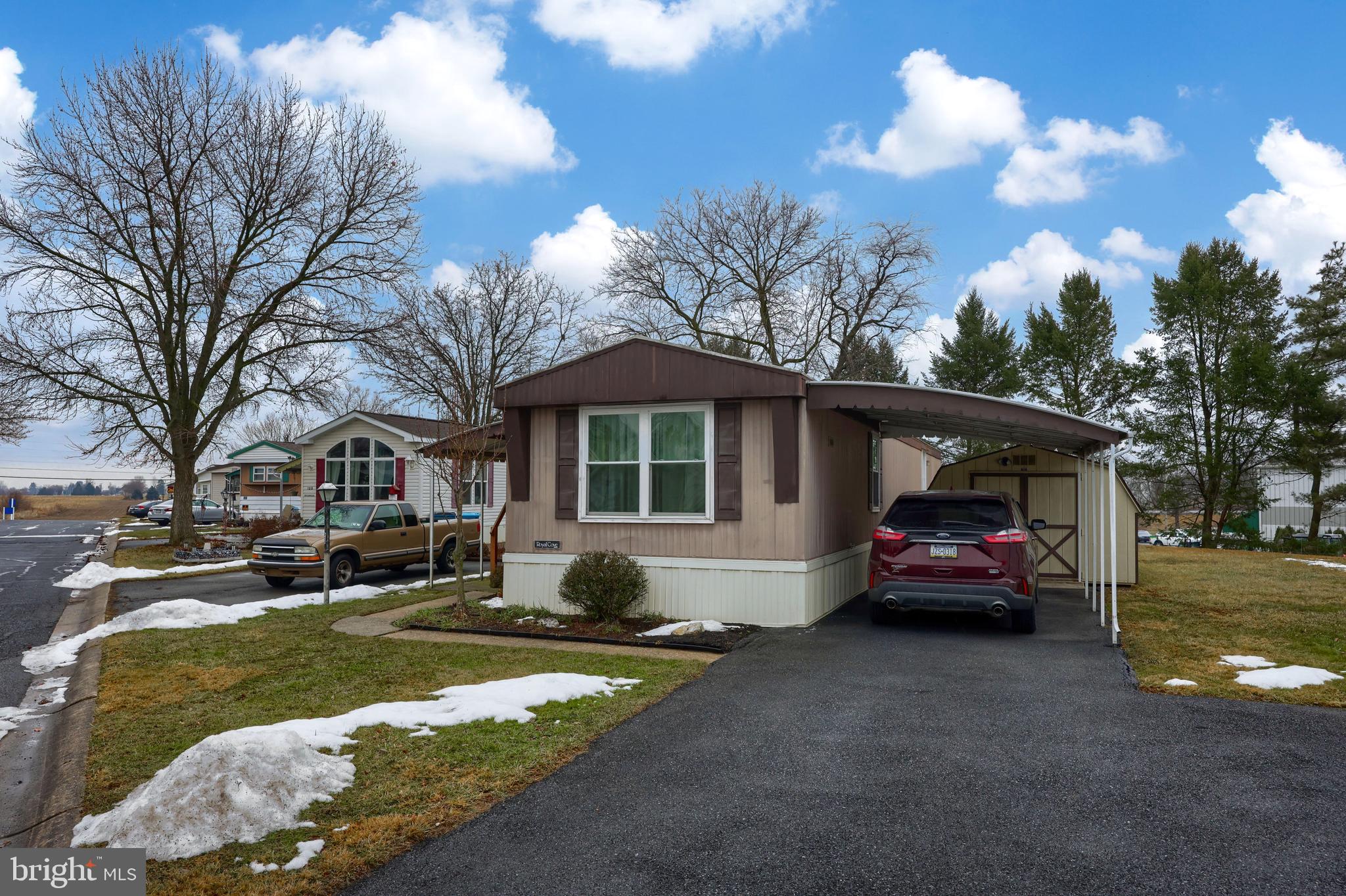Welcome home to this cozy 2-bedroom, 1-bathroom mobile home located in the peaceful community of Ridgewood Manor in Manheim, PA! This well-maintained home offers comfortable, single-floor living with an smart layout. The spacious living area flows seamlessly into the bright kitchen, featuring ample cabinet space and room for dining.
Furnace, water heater, washer/dryer, and carpet are all new within the past 2 years.
Both bedrooms are well-sized, with plenty of natural light and large closets. Enjoy three off-street parking spaces included a carport. Two oversized sheds for plenty of storage. A covered patio off the side porch to enjoy your morning coffee or a relaxing evening.
Come be a part of this well-maintained and community-oriented park that is conveniently located just minutes from Route 283. This home is ideal for those looking for affordable homeownership in a quiet, friendly neighborhood.