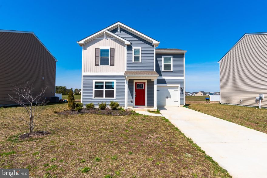 Welcome to the desirable Southern Fields neighborhood, located on the south end of Pocomoke. This beautifully maintained home, just 2 years young, offers an open floor plan perfect for modern living. The spacious living room flows seamlessly into the breakfast bar, which overlooks the kitchen and dining area—ideal for entertaining or everyday living.
Upstairs, you'll find a primary suite complete with a private bathroom with walk-in shower, and generous walk-in closet. Two additional guest bedrooms, a full guest bath, and a convenient laundry closet round out the second level.
The expansive rear yard provides plenty of space to create your own outdoor oasis, making this home a true retreat. Don't miss out on the opportunity to make this stunning property your own!