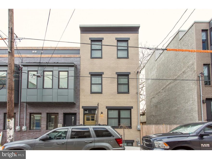 FIRST MONTH FREE: Landlord is offering a one month credit for any lease signed by January 31, 2019! Offering ONE MONTH FREE on a lease signed before 1/31/2019. Come see this must see new construction, 3 bedroom, 2.5 bath home in the heart of Point Breeze. This home features amazing hardwood flooring, a finished basement and THREE private outdoor spaces! Step into the wide open living room and dining room, complete with a double front window, tall ceilings, recessed lighting and beautiful hardwood floors. The open white kitchen is dressed in quartz countertops, stainless steel appliances and a tile backsplash. This level also offers a convenient and modern half bath. Double doors lead you to a nice rear yard with fence. On the second floor you'll find two nice bedrooms with windows, double closets and wood flooring. Off the the hall is a full tile bath and a laundry closet with washer/dryer included! The third floor offers the main bedroom suite with a walk-through closet, additional closet, terrace, and a full tile bath with stall shower and contemporary vanity. Additionally, enjoy a rooftop terrace, with impeccable views of the skyline from sunrise to sunset! The finished basement makes the perfect den, family room or office.