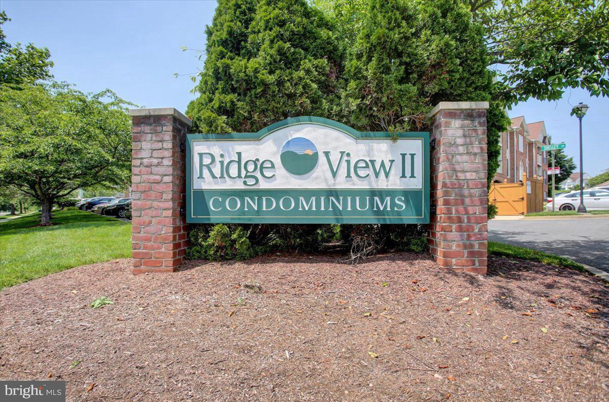 This move-in ready, spacious TOP-floor condo with ELEVATOR is nestled in sought-after Whittier Neighborhood . Views of the mountains from your kitchen. It features two generously sized bedrooms and two full bathrooms. Second bath with JETTED TUB/SHOWER. A charming private balcony, located just off the dining area, offers a tranquil space to relax. The condo seamlessly blends style, convenience, and low-maintenance living. The kitchen boasts NEW STAINLESS STEEL APPLIANCES & SINK. PLUS NEW QUARTZ COUNTER TOPS beautiful oak cabinets, while the in-unit laundry room, equipped with a NEW WASHER AND DRYER adds extra ease. Upgraded Luxury Vinyl Flooring and Carpet though- out. You'll also benefit from a reserved parking space, with ample visitor parking available. Ideally located near major commuter routes, shopping, restaurants, and just a short walk to Whittier Park, this home offers all the convenience you need.