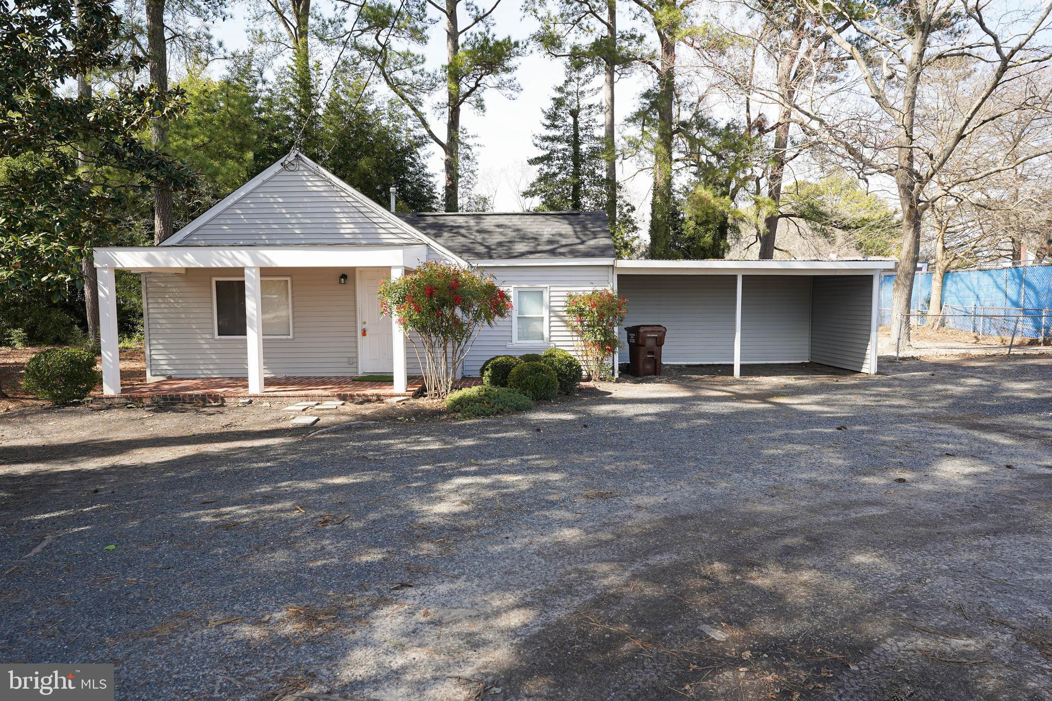 Adorable and affordable 3BR/1BA rancher on a nice-sized lot on Camden Avenue - approx 1 mile to Fruitland's big-box store shopping/dining hub - or 4 miles to some more unique shopping, dining, and events in Downtown Salisbury. Welcoming brick front porch. Bright and breezy living room with vaulted ceiling opens into the dining room. Bright and cheery kitchen w/granite counters, gas cooking. 3 bedrooms and a full bath with tub/shower combo. Upstairs, floored attic space offers tons of storage. Plenty of room for your guests to park in the 2-car carport or your circular drive. Call today to call this charming house your new home! Sizes, taxes are approximate. Agent has financial interest; owners are licensed realtors in the states of Maryland and Delaware.