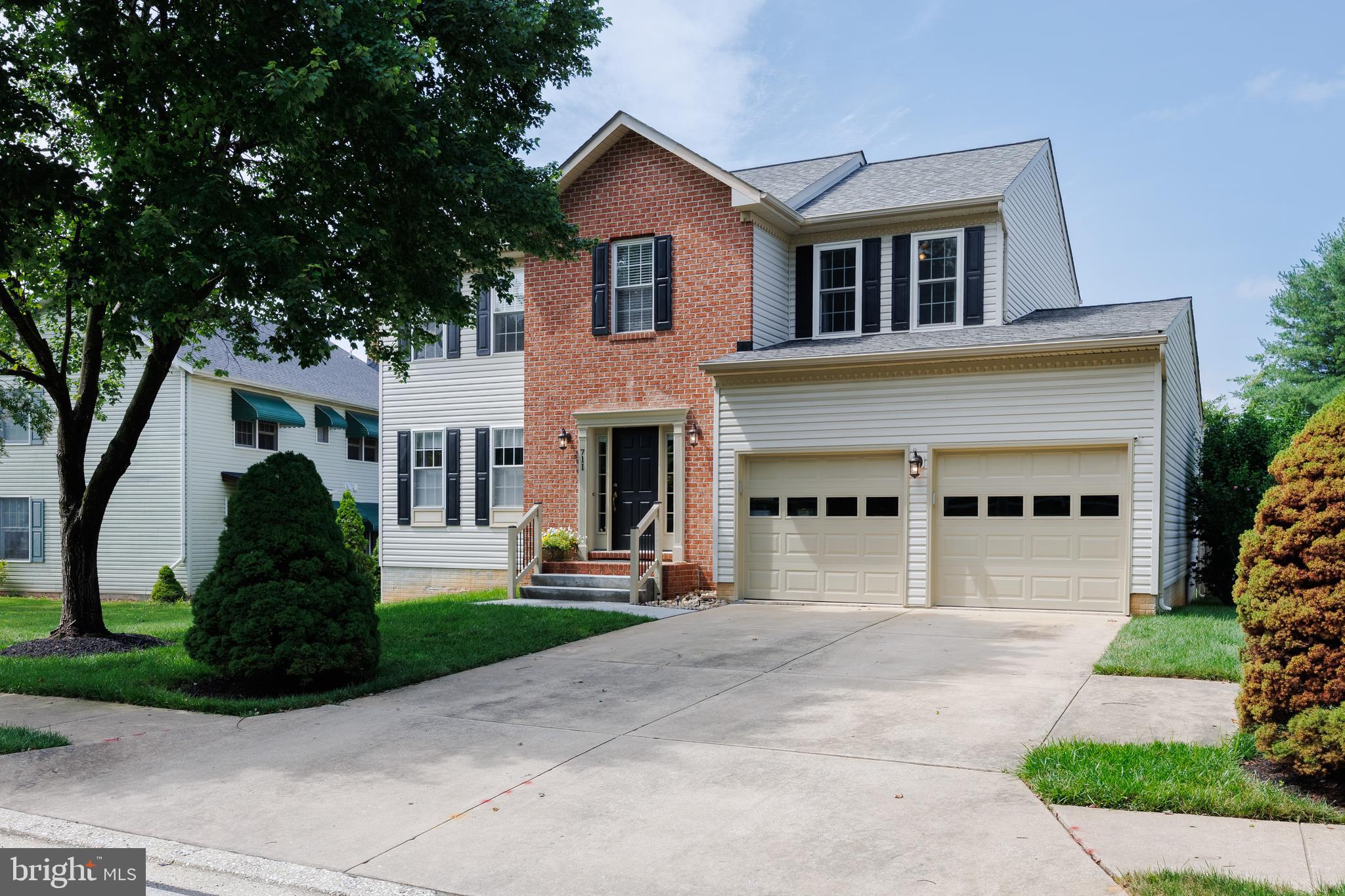 Incredible New Price!! This charming colonial with wonderful curb appeal is highlighted by a beautiful front entry with upgraded steps and attractive handrails. This home offers 4 spacious bedrooms, 3.5 bathrooms and is brimming with desirable features throughout. Step inside to a 2-story foyer with hardwood floors that flow through the hallway and main level powder room. A beautifully appointed kitchen is complete with a generously sized island, granite countertops, stainless steel appliances, electric range with gas hookup available, pantry, ceramic tile flooring, & backsplash. The inviting eat-in kitchen also offers a newer slider that opens to a lovely screened-in porch. The adjacent deck, which overlooks a fenced level backyard, is perfect space for grilling or soaking up the sun. The large, sunlit family room, anchored by a gas fireplace that is beautifully framed by custom windows on either side, with an additional transom window above creating a striking architectural focal point. Main level laundry is a bonus with built-in cabinets. Upstairs, the primary bedroom features a large walk-in closet and French doors that open to a private bath with double vanities, dual mirrors, a soaking tub, and a separate shower. Three generous size bedrooms and a full bath with a tub/shower combo complete the upstairs. Each of the four bedrooms includes ceiling fans for added comfort. The finished basement adds even more living space, showcasing stylish luxury vinyl flooring, a beautifully tiled full bathroom, a spacious recreation area, and 2 storage rooms. Outside, enjoy a fully fenced back yard, a handy storage shed, and a spacious two-car garage. Some wonderful updates include New Roof (2020), New HVAC (2020), Tankless Hot Water Heater ( 2019) and a water filtration system. Perfectly located between Baltimore and Washington, this home is close to commuter routes, schools and great amenities including historic downtown Sykesville with charming shops, fun festivals, weekly farmer's market and restaurants plus Piney Run Park that offers miles of trails, boating, kayaking, fishing, tennis, pickle ball, playgrounds and more! Welcome Home!