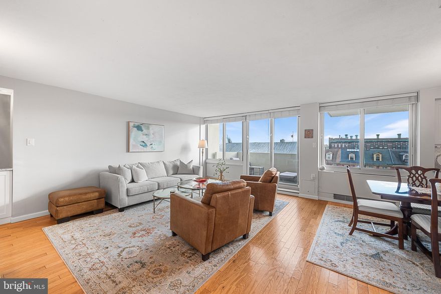 Experience luxurious living in this beautifully renovated, light-filled corner condo in the heart of Washington Square Park. This unique three-bedroom, two-and-a-half-bathroom residence offers an exceptional layout, combining a two-bedroom unit with an adjacent efficiency to create spacious living areas and generously sized bedrooms.  Step into the inviting entry foyer, complete with a large storage room and coat closet, which opens into an expansive open-concept living space. The stunning kitchen boasts sleek granite countertops, stainless steel appliances, ample wood cabinetry, and a convenient in-unit washer/dryer.  A dining area with a built-in granite counter hutch seamlessly flows into the grand living room, featuring a south-facing balcony and oversized windows that bathe the space in natural light. A powder room is conveniently located off the living area. The primary bedroom suite is a true retreat, showcasing large windows, an enormous walk-in closet, and a luxurious bathroom with a walk-in shower, abundant cabinet space, and granite countertops. Two additional well-proportioned bedrooms with ample closet space share a tastefully appointed hall bathroom.  Located in the prestigious, award-winning Hopkinson House, a full-service, non-smoking building, residents enjoy 24-hour desk staff, package concierge, a spectacular rooftop pool (for a fee), a beautifully landscaped patio, and 2-car underground parking available ($230/month/car).  With a perfect Walk Score of 100, this condo offers unparalleled access to the best of city living.  Two blocks from McCall Elementary/Middle School and Acme Markets. Rent includes all utilities, cable TV, and high-speed internet.