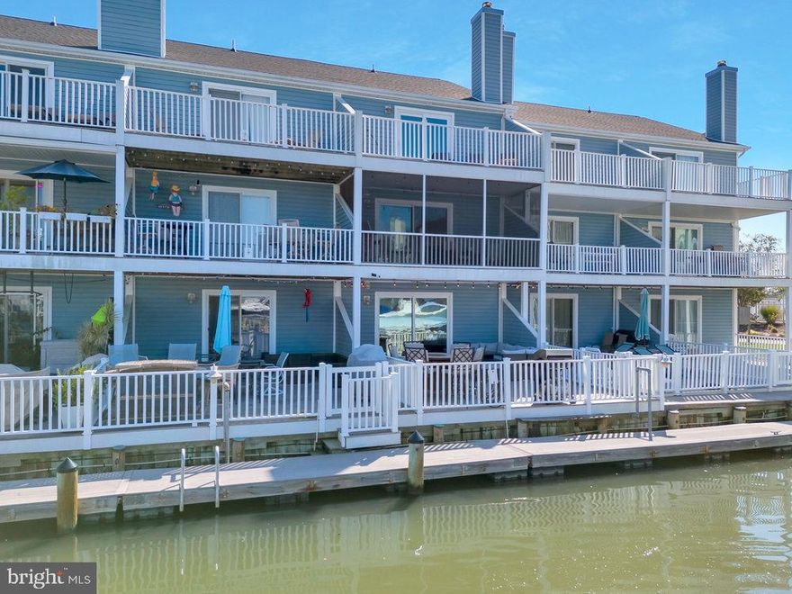 Waterfront living in Ocean View! This beautiful 3-bedroom, 3.5-bath townhome offers 3 levels of laid-back, coastal living. Nestled in the quiet yet popular community of Bethany Marina, the front of the house faces natural marshland while the back of the home cozies up to a gorgeous canal leading to Pingally Point and the Indian River Bay. The first floor of the home features a large bedroom with a private bathroom that leads to a spacious back deck and access to your own deep-water boat slip. It’s the perfect place to entertain or simply relax and enjoy the sounds of the water. The second floor opens up to a generously-sized kitchen with a breakfast bar, a half bath, and large living space with a wood-burning fireplace and sliding glass doors to a second-floor balcony overlooking the canal. The third floor features a large primary suite with an ensuite bathroom and another spacious bedroom with an additional private bathroom. A third deck is accessible from the third floor, offering unmatched coastal views and some of the most beautiful sunsets you’ll see in Sussex County! The home also includes a one-car garage with additional off-street parking, just steps from the community pool. Located just a few miles away from downtown Bethany Beach, Cape Henlopen State Park, James Farm Ecological Preserve, and the charming John West Park, this home would make the perfect full-time residence, investment property, or summer getaway. Homes in Bethany Marina go fast, so don’t miss your chance to call this one yours. Schedule your private showing today!
