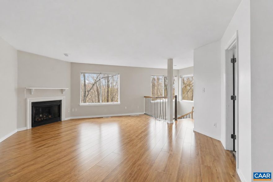 Priced BELOW tax assessment to reflect flooring updates needed, this is an exciting opportunity to build instant equity and customize the space to your style. A flooring quote of approximately $10,000 is already available and may be financed into the purchase with the work potentially completed before closing?making this property even more turnkey for the next owner. Welcome to Riverrun Condominiums?one of Charlottesville?s hidden gems beside Pen Park and just minutes to Downtown Charlottesville, UVA, Route 29, the Rivanna Trail, shopping, dining, and more! This spacious 3-bedroom, 3-bath condo offers a rare and highly functional layout with EVERY bedroom featuring its own private ensuite bath?ideal for guests, roommates, students, professionals, or an incredible addition to an investment portfolio. Natural light pours through oversized windows overlooking peaceful wooded views, creating a private retreat feel while still being close to everything Charlottesville has to offer. The striking spiral staircase adds architectural charm and a unique focal point you won?t find in cookie-cutter condos.