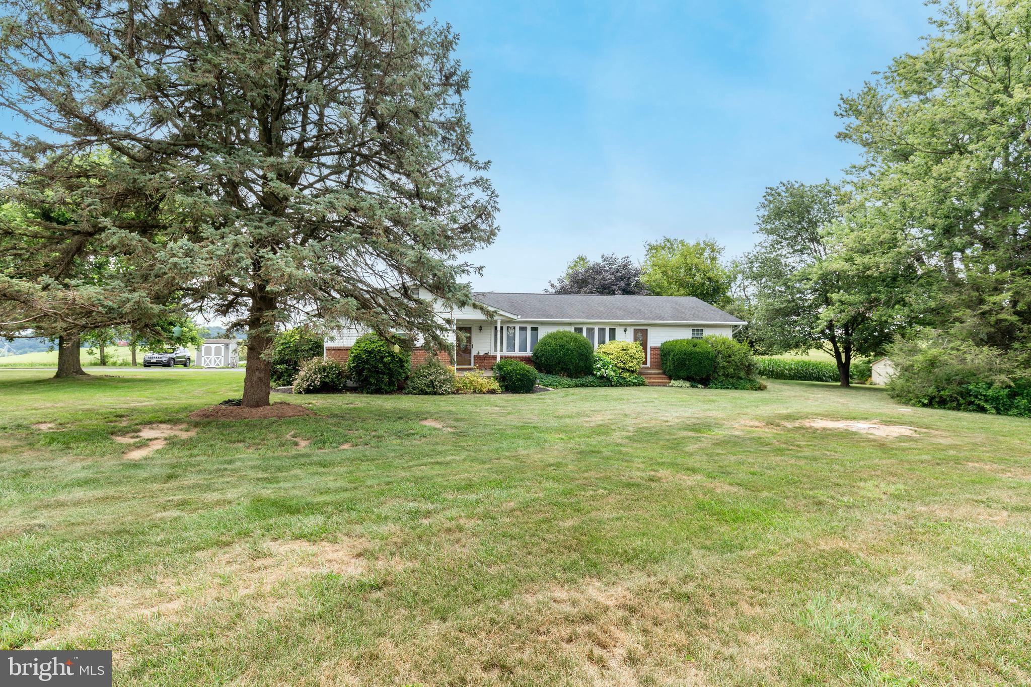 Look no further—your pink unicorn has arrived! Nearly 4,000 sq ft of living space on a private one-acre lot. Live in the beautifully updated 3-bedroom unit—featuring a renovated kitchen, new flooring, refreshed bath, and fresh paint—and rent out the 2-bedroom unit for added income. This unique property includes 2 electric meters, 2 septic systems, and 1 shared well. The basement is shared, but each unit has separate laundry, HVAC systems, and water heaters. A rare find with endless possibilities!
