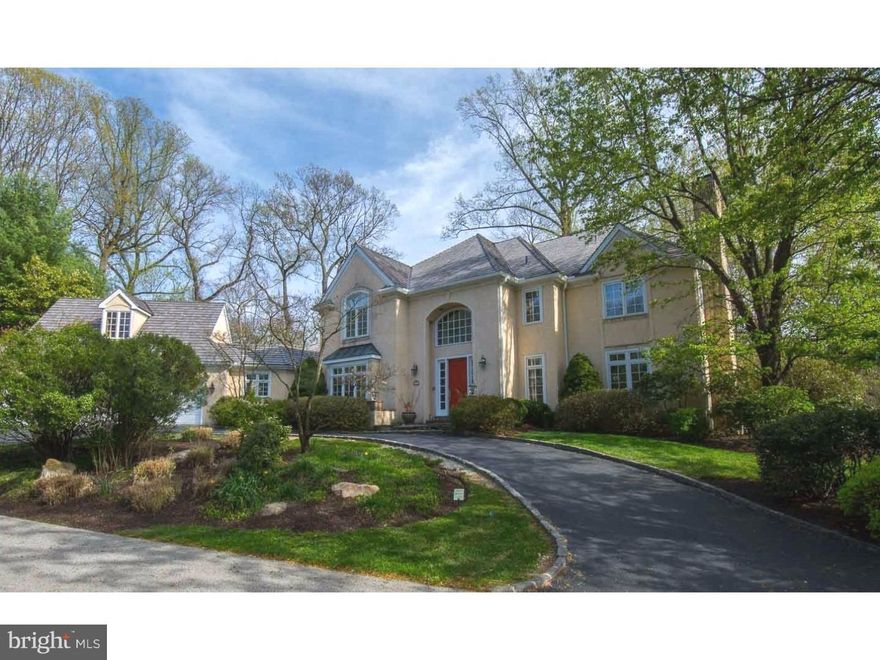 Wonderful price adjustment! 20 mins from Center City this Classically Elegant and Refined French Manor Home is stunning and impeccably maintained. This property is nestled into one of Penn Valley's most beautiful lush, wooded settings.  The Grand Entrance Hall and Staircase set the tone for this custom home. It is open and flooded by light from the many windows. Breathtaking views are everywhere. The generous Living Room and Dining Room are perfect for entertaining.  Sparkling white cabinets and granite countertops make the Chef's Kitchen a delight. The handsome Library, the relaxing Family Room and the charming Sun Room exquisitely complete this level.  The Master Bedroom Suite serves as the perfect retreat with a luxurious Master Bathroom with two vanities.  Just down the hall, there is an En-Suite Bedroom and two additional Bedrooms.  The daylight Family Room, En-Suite Bedroom/Office and Gym make the lower level an exciting part of this home with its additional 1600+ square feet.  Numerous features include: Hardwood Floors, built in closets, 4 Fireplaces, a Three Car Attached Garage, an inviting Outdoor Pool, and extensive architectural details. The extremely convenient location and award winning Lower Merion schools make this the perfect home.